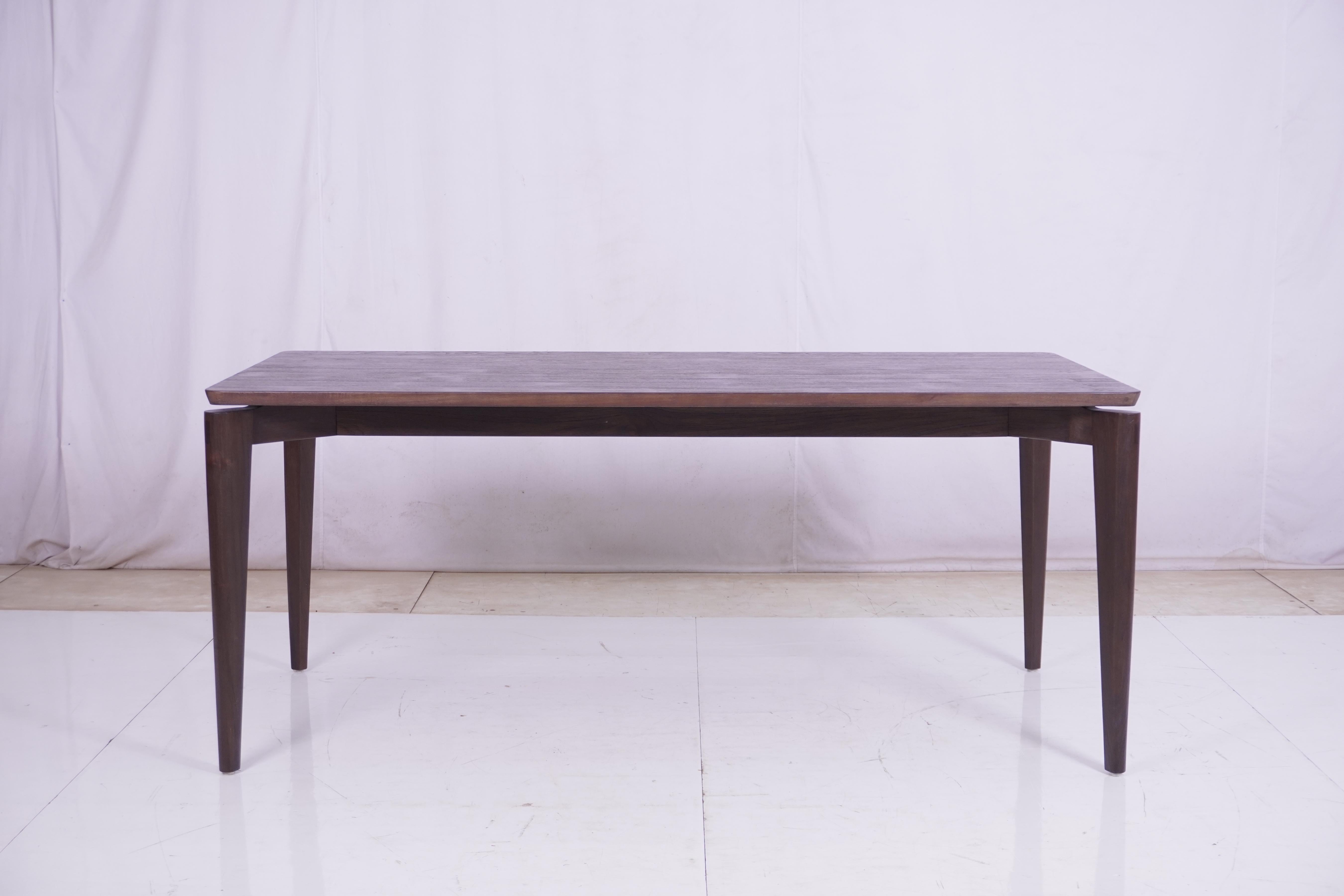 This teak table is simple and elegant with fine craftsmanship and a smooth surface for easy cleaning. Beautiful inlay detail on the upper leg as well. Seats 6 people.

Care and maintenance: wipe with dry cloth regularly, avoid using abrasive