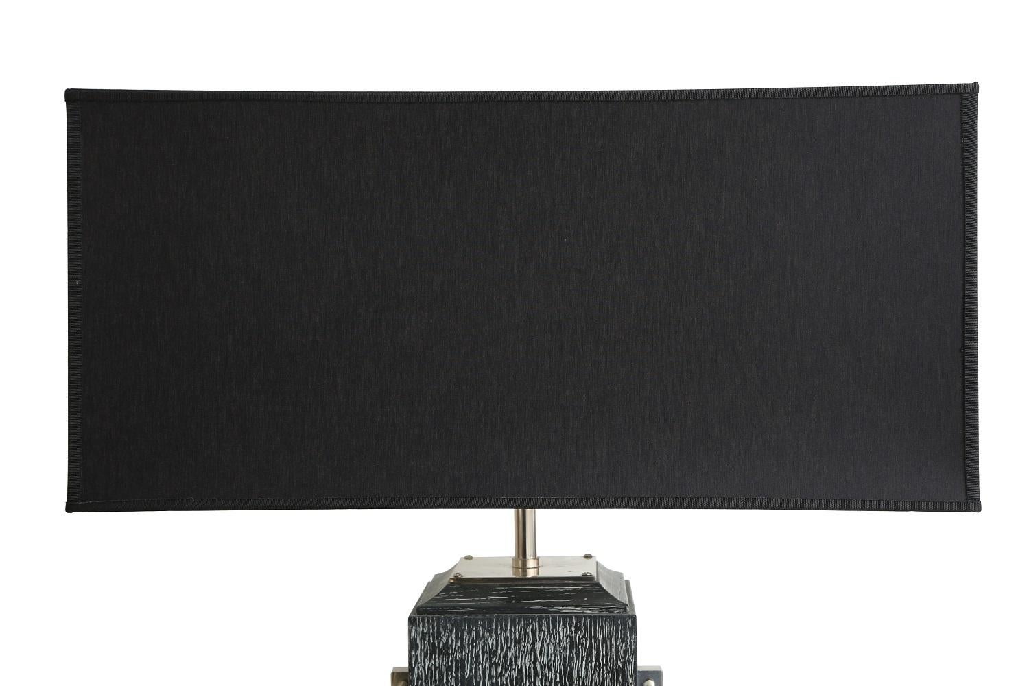 Dark pickled oak table lamp with silver plated brass ornaments and black fabric shade by Chelini. Made in Italy.
33.4