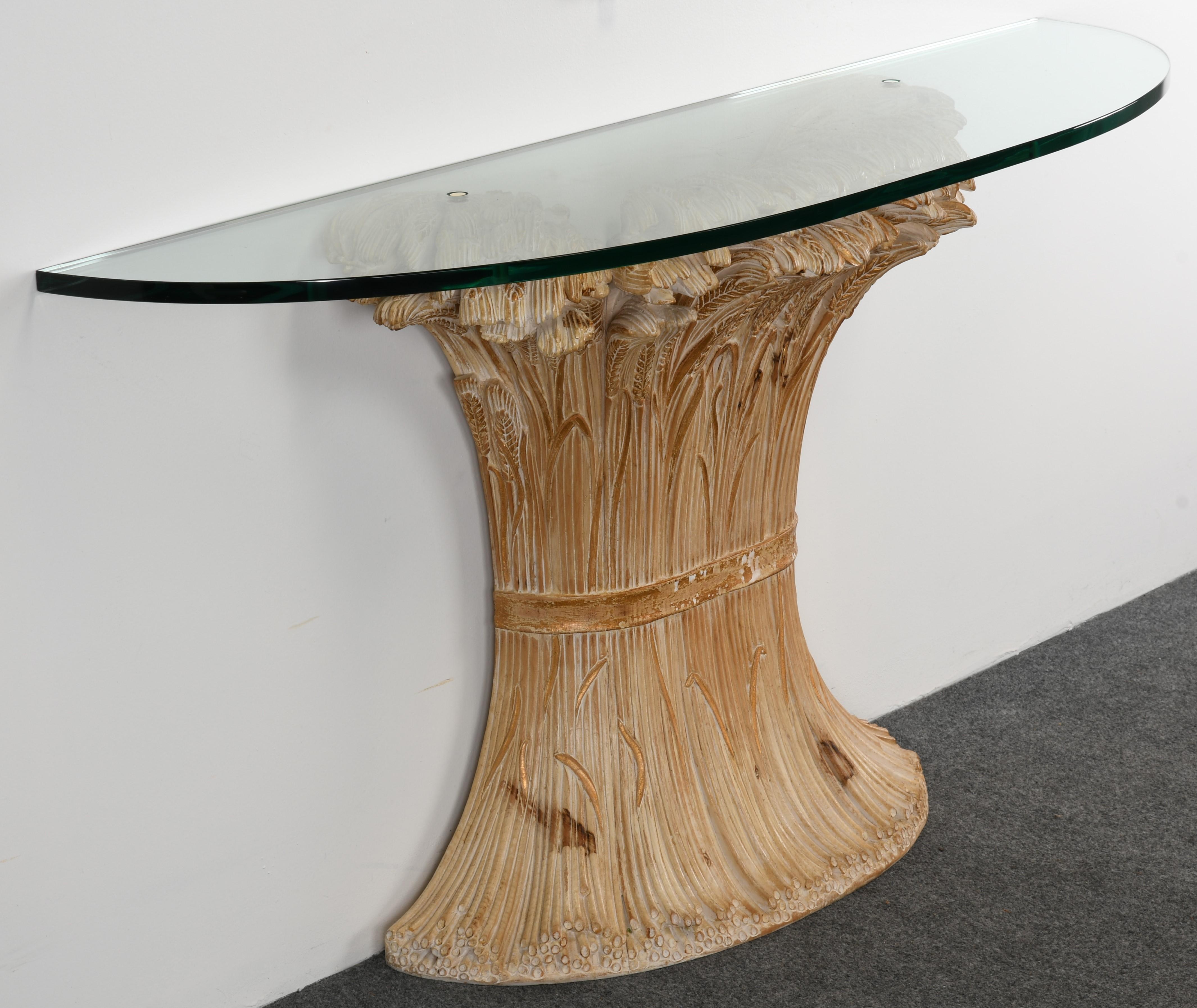 A hand-carved Italian wheat sheaf console table by Chelini. This fabulous console has beautiful carvings with a parcel gold gilt accent. Some minor wear to gilt decoration, but overall in good condition. Glass is not included, glass can be ordered