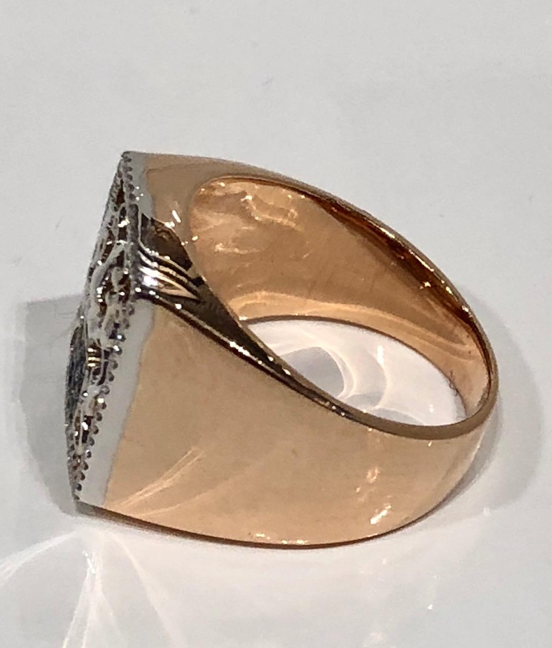 Unisex 18k rose gold Signet Ring with white and black diamond face. white gold detail relief ariund diamond set bezel
Designed by Martyn Lawrence Bullard
Available in any size, lead time 4 weeks