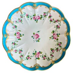 Piatto rotondo Chelsea-Derby, turchese con ghirlande di rose rosa, 1775 ca.