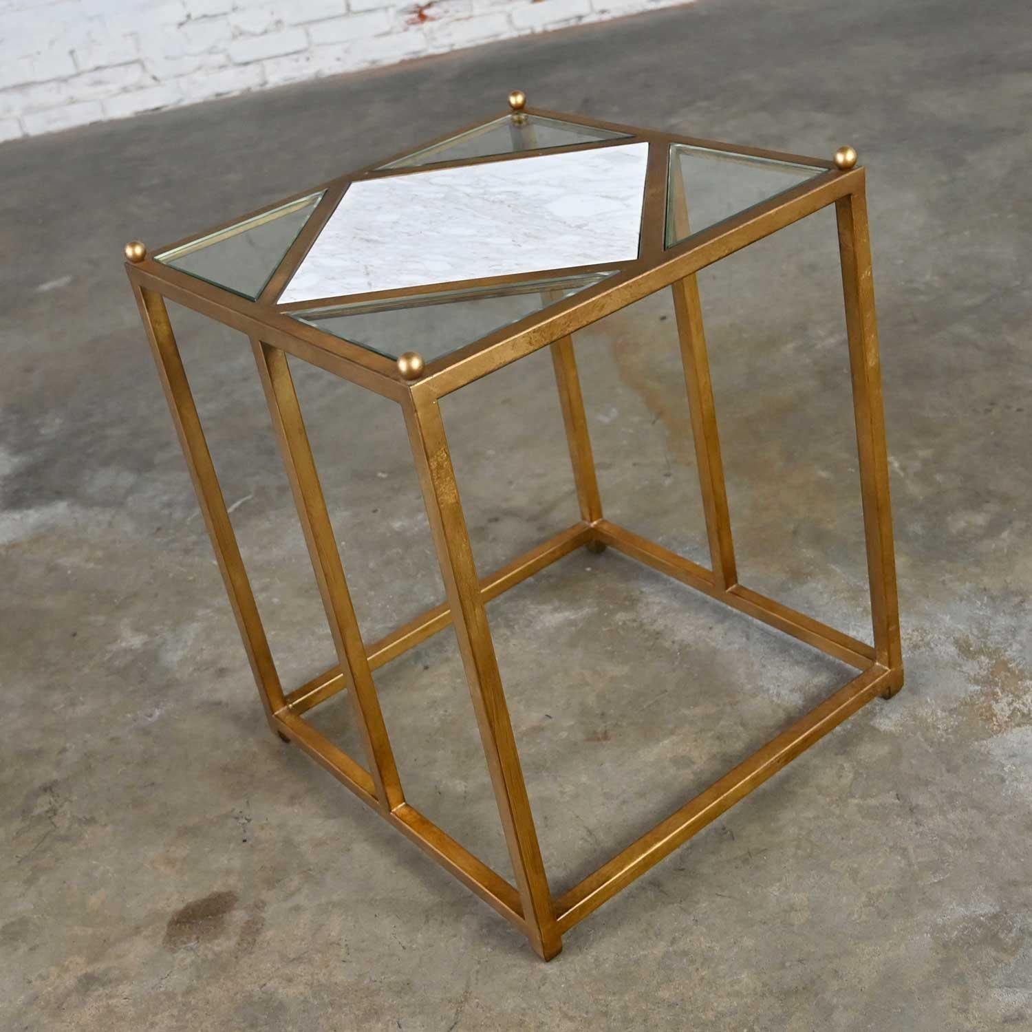 Gorgeous Chelsea House Jamie Merida Collection Harlequin side table comprised of antique gold leafed iron with white marble inlay and glass top. Beautiful condition, keeping in mind that this is vintage and not new so will have signs of use and