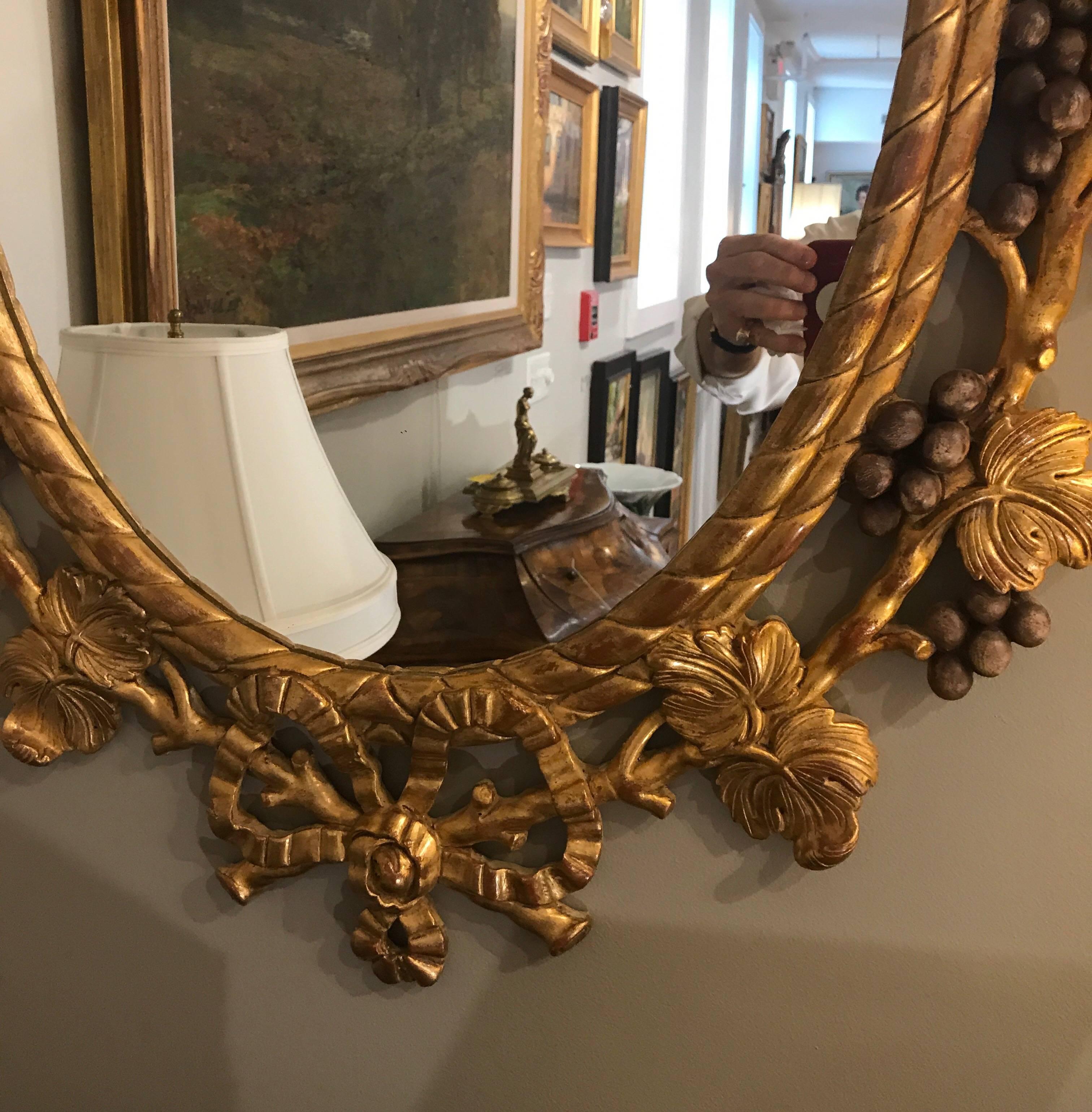 American Chelsea House Oval Gilt Mirror