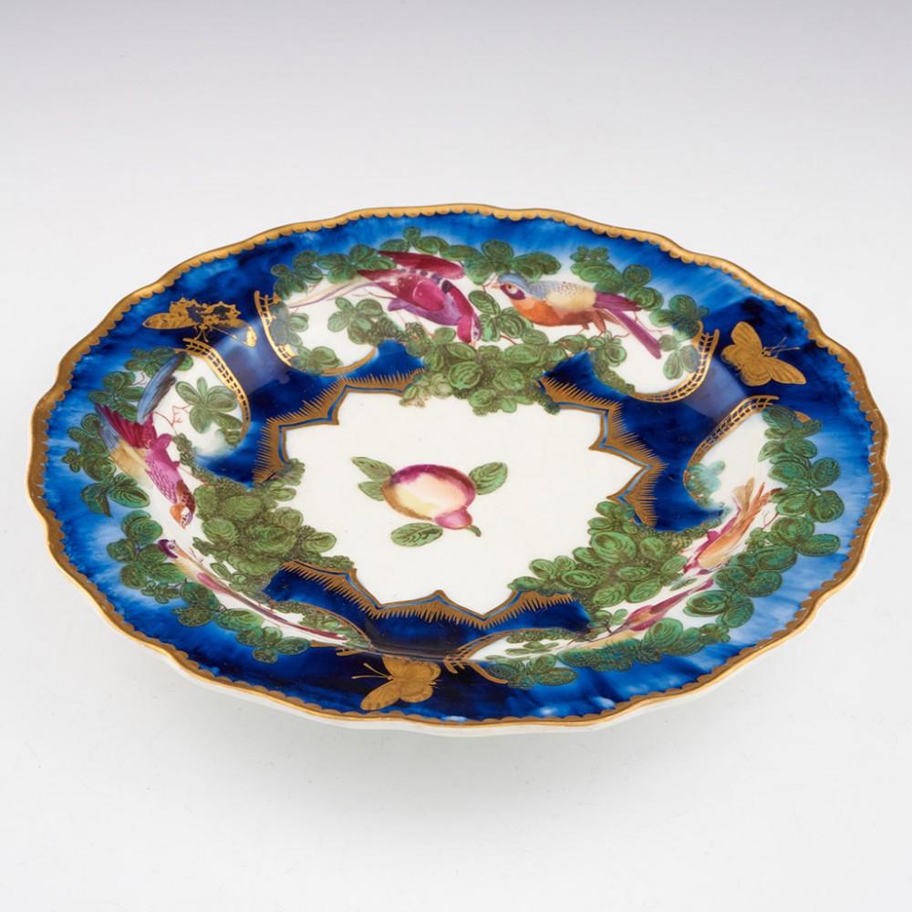 Chelsea Porcelain Dessert Dish, c1765

Additional information:
Date : c1765
Period : George 11- George III
Marks : Gold anchor
Origin : Chelsea , London
Colour : Polychrome
Pattern : Central fruit with birds and gilded butterflies
Condition : Very