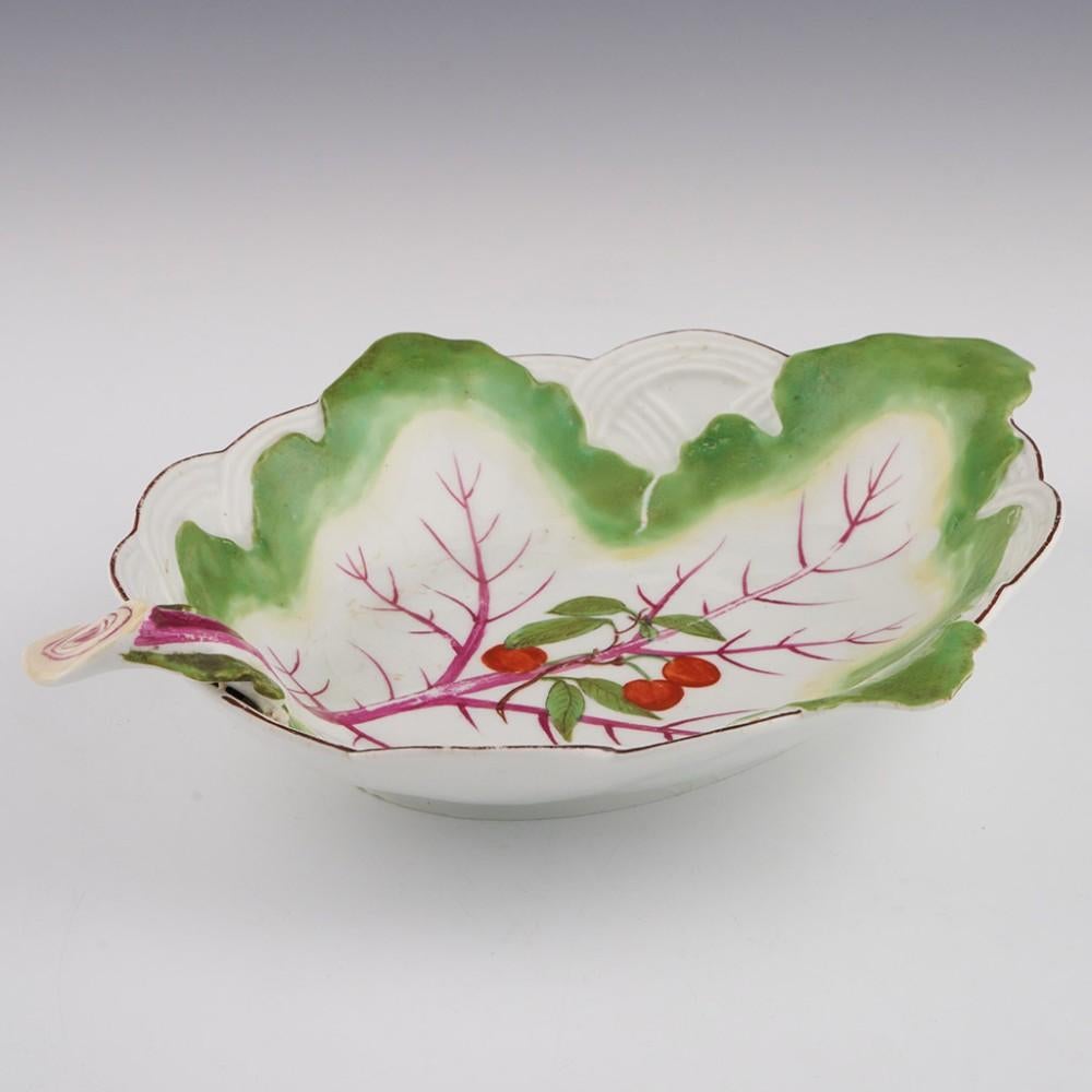 Heading :  Chelsea porcelain fruit dish
Date : c1760
Period : George II / George III
Marks : Brown anchor
Origin : Chelsea, England
Colour : Polychrome
Features: Brown line rim, moulded
Condition : Excellent, no chips or cracks - a little glaze
