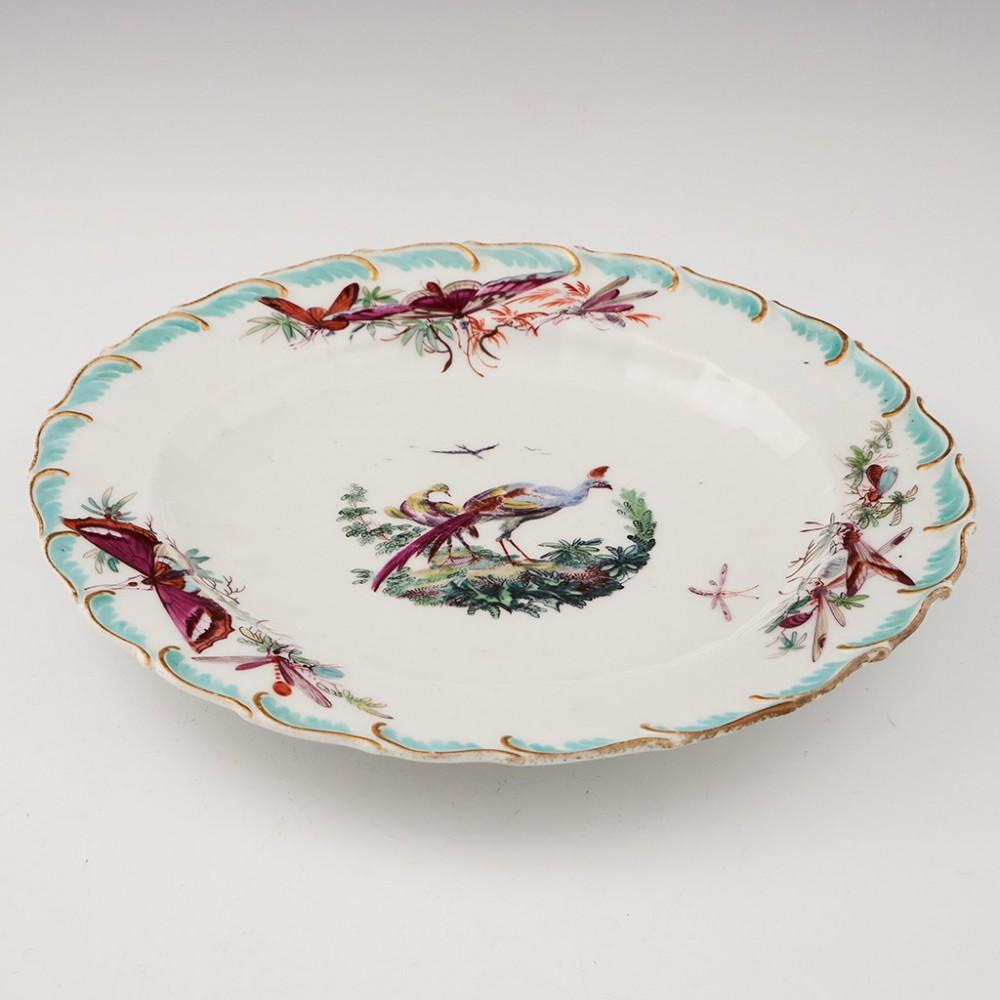 Chelsea Porcelain Gold Anchor Feather-Edged Dessert Plate, 1756-1769

Additional information:
Date : 1756-1769
Period : George II - George III
Marks : Gold Anchor
Origin : Chelsea (London), England
Colour : Green and gilt 'feather edged' moulding to