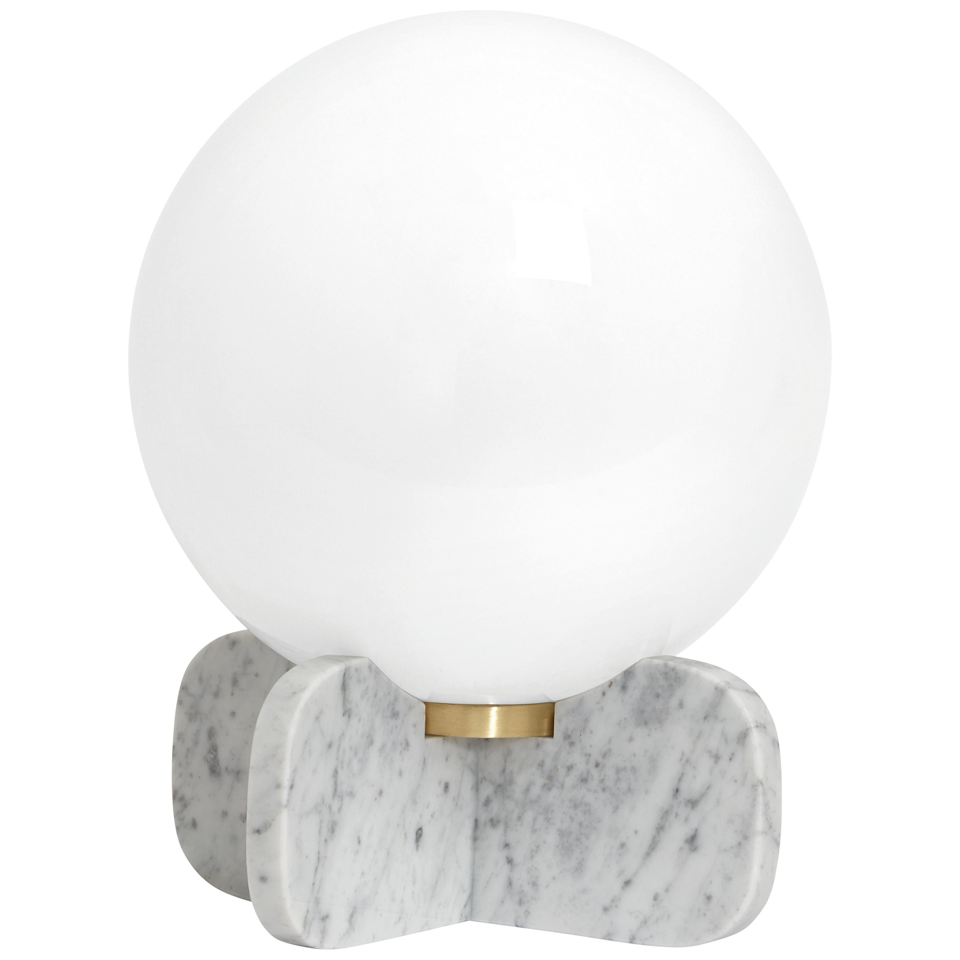 Chelsea table lamp by CTO Lighting
Materials: Polished white carrara marble with satin brass and opal glass shade
Dimensions: W 30 x D 30 x H 38 cm

Also available in black marquina, please contact us.

1 x E26, 60w max (or 8w LED 2700k)
weight 6kg