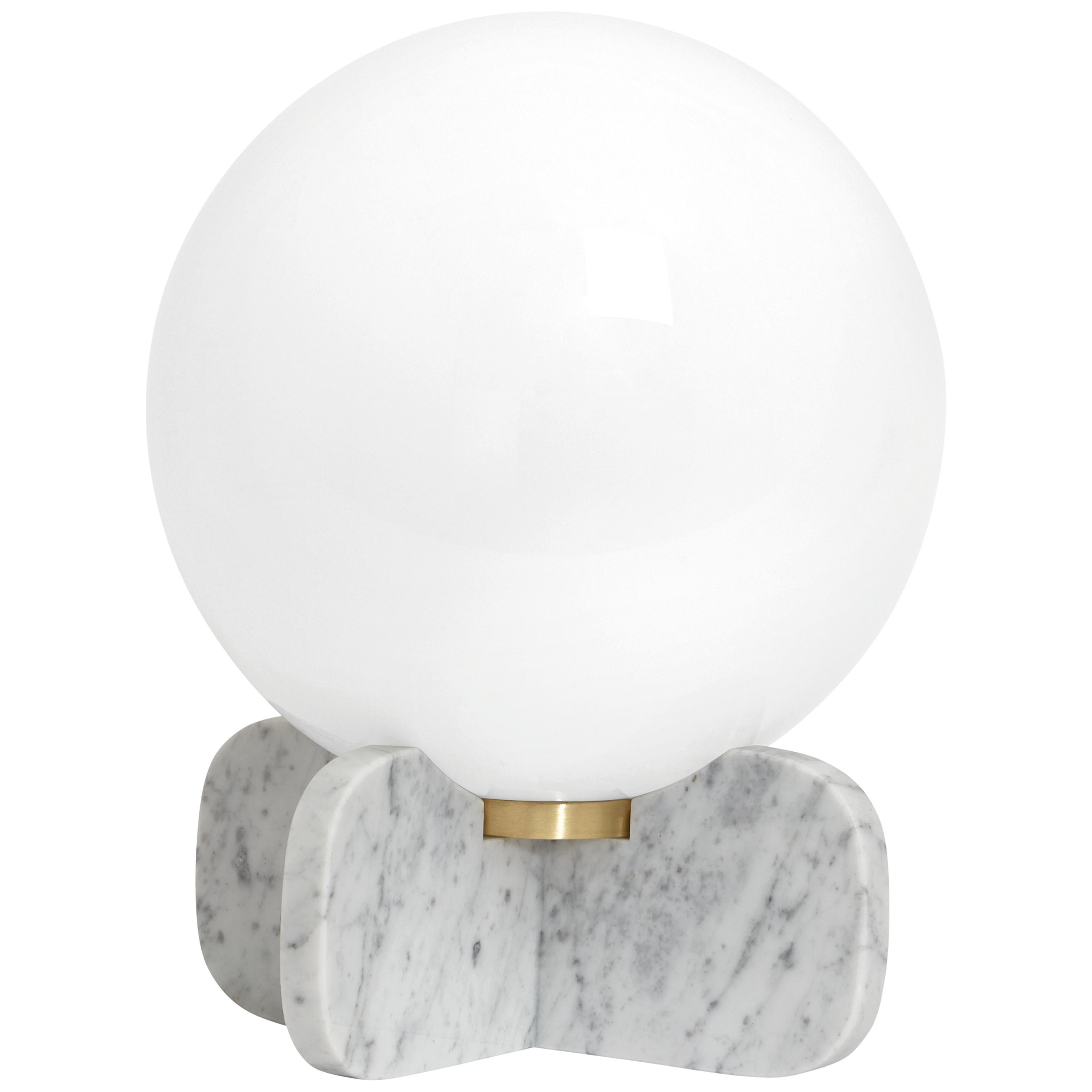 Chelsea table lamp by CTO lighting
Materials: polished white carrara marble with satin brass and opal glass shade
Dimensions: W 30 x D 30 x H 38 cm

Also available in black marquina.

1 x E26, 60w max (or 8w LED 2700k)
weight 6kg