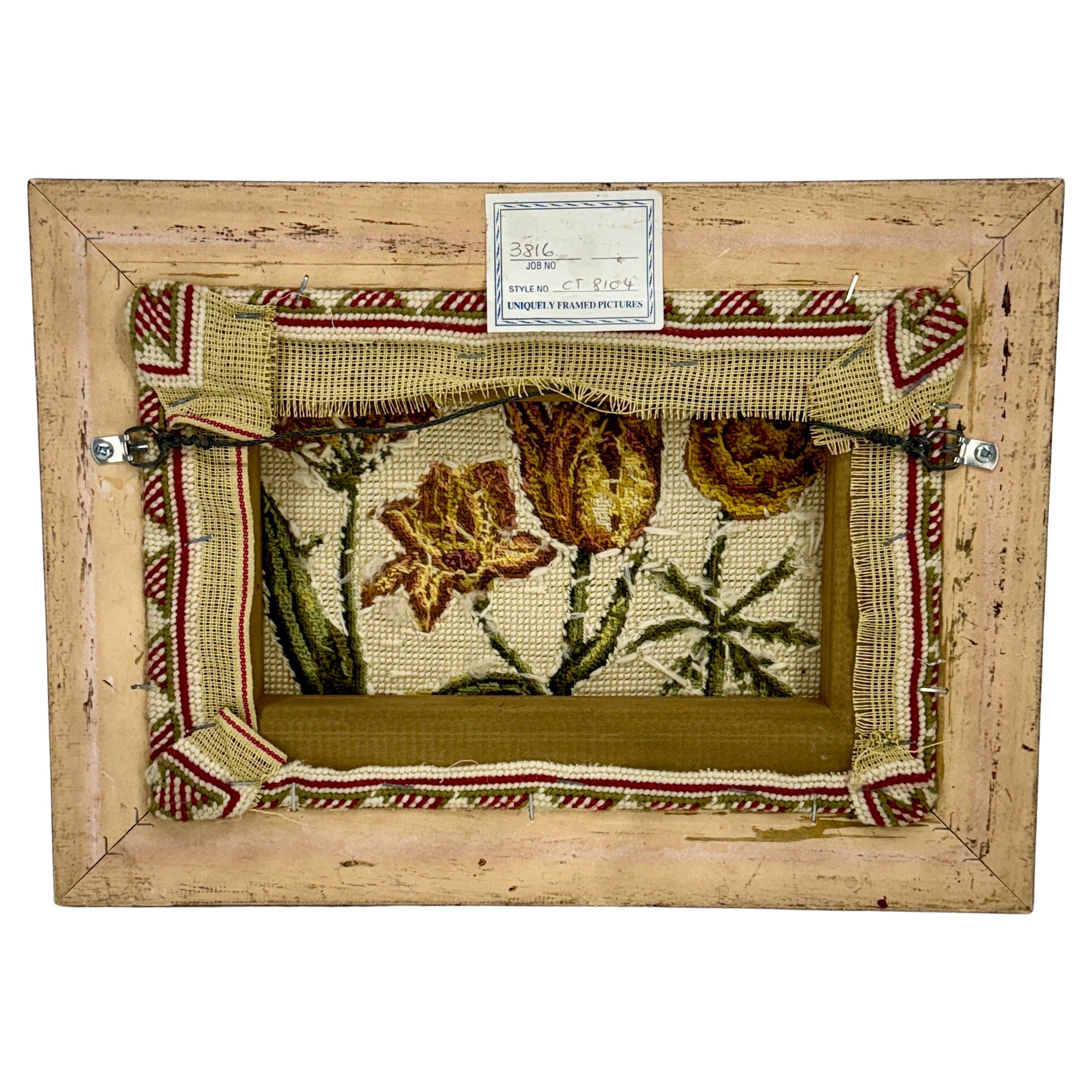  Needlepoint Wood Framed Artwork of Tulips from Chelsea Textiles

One-of-a-kind needlepoint artwork from Chelsea Textiles. This framed artwork features tulips in rust, orange, yellow and green colors. This classic piece of art would make a suitable