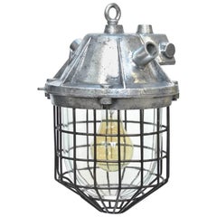 Chemical Industry Light with Thick Glass Cover by Fence, circa 1950