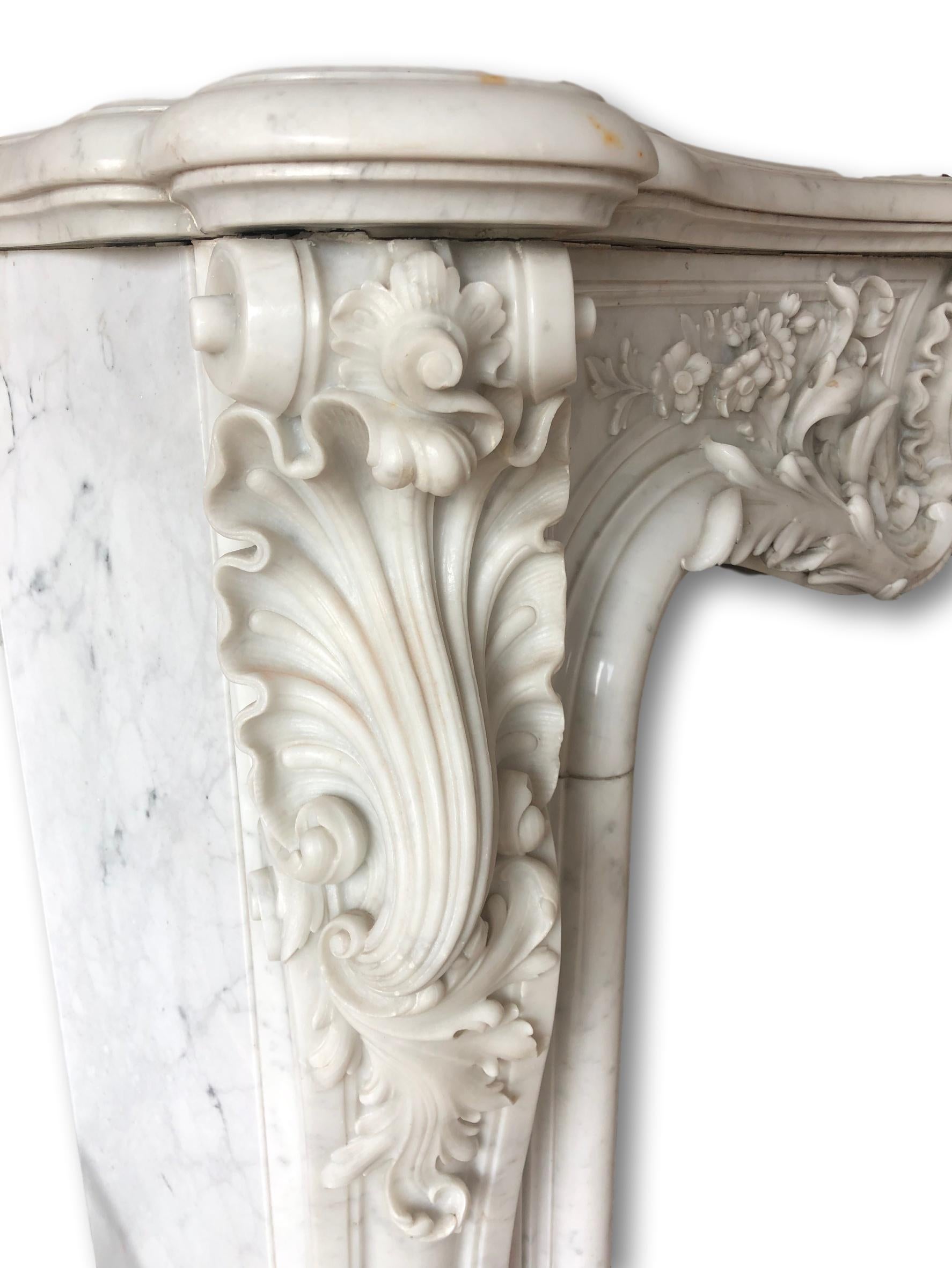 This very beautiful Louis XV style fireplace was made during the 19th century out of Carrara marble. 

Dimensions: 68