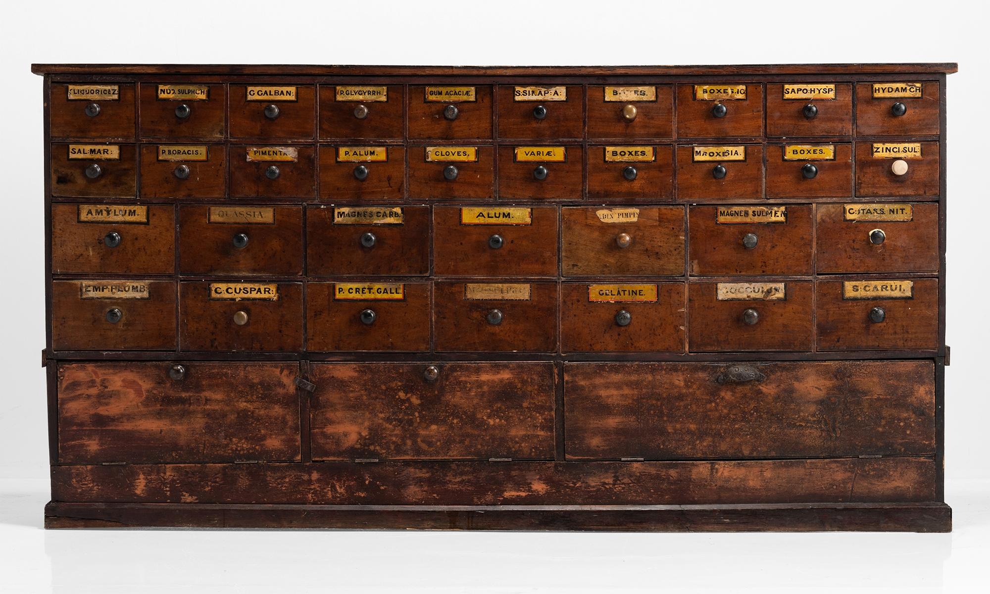 Chemists bank of drawers, England, circa 1900.

Beautiful Victorian bank of military drawers in mahogany with brass fittings. (Breaks into 3 pieces).