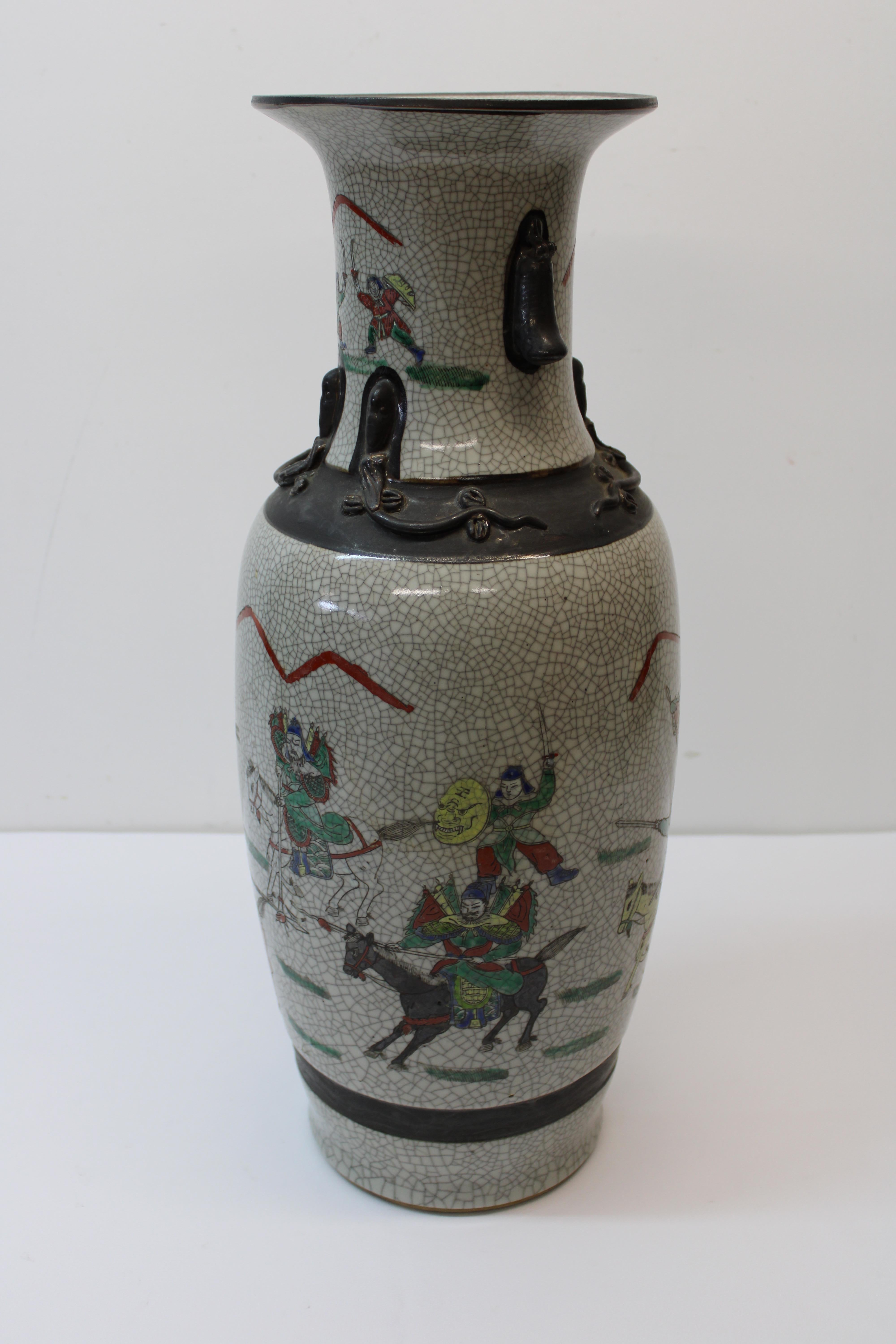 C. 1940's hand painted Cheng Hua porcelain vase w/ scene depicting warriors is a must have for any home. Whether it be sitting alone or if you have your favorite plant inside of it, It is a true Beauty.