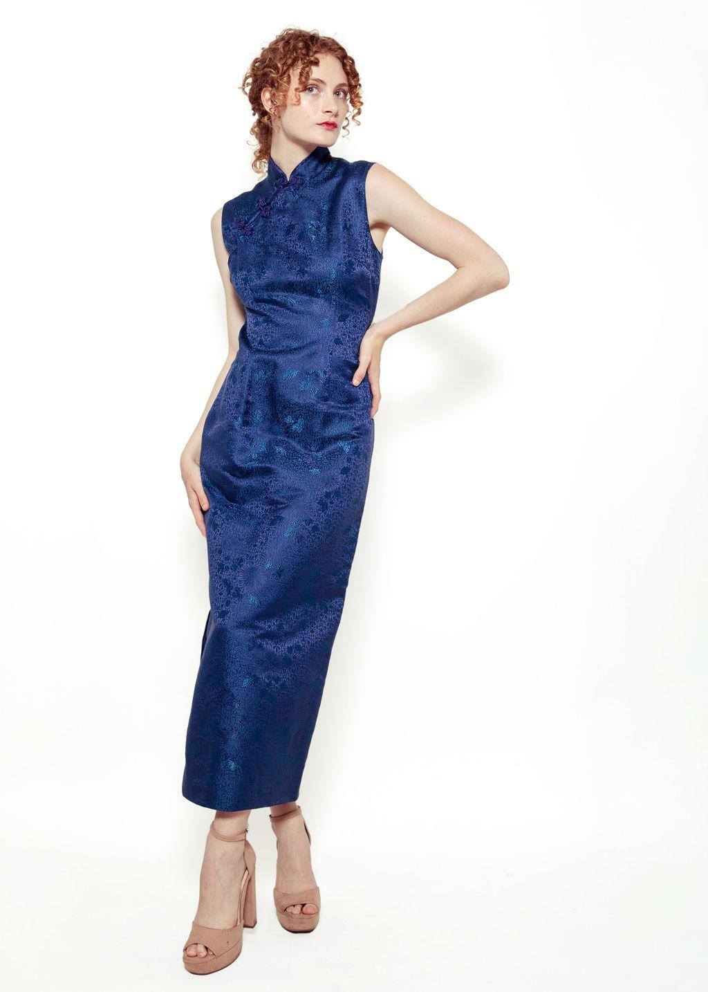 This Cheongsam Brocade Dress is fit for a royal.

The beautiful Midnight blue combined with the intricate floral brocade fabric will make you feel and look your best. This dress is pretty structured and does not have much stretch. 

In great vintage