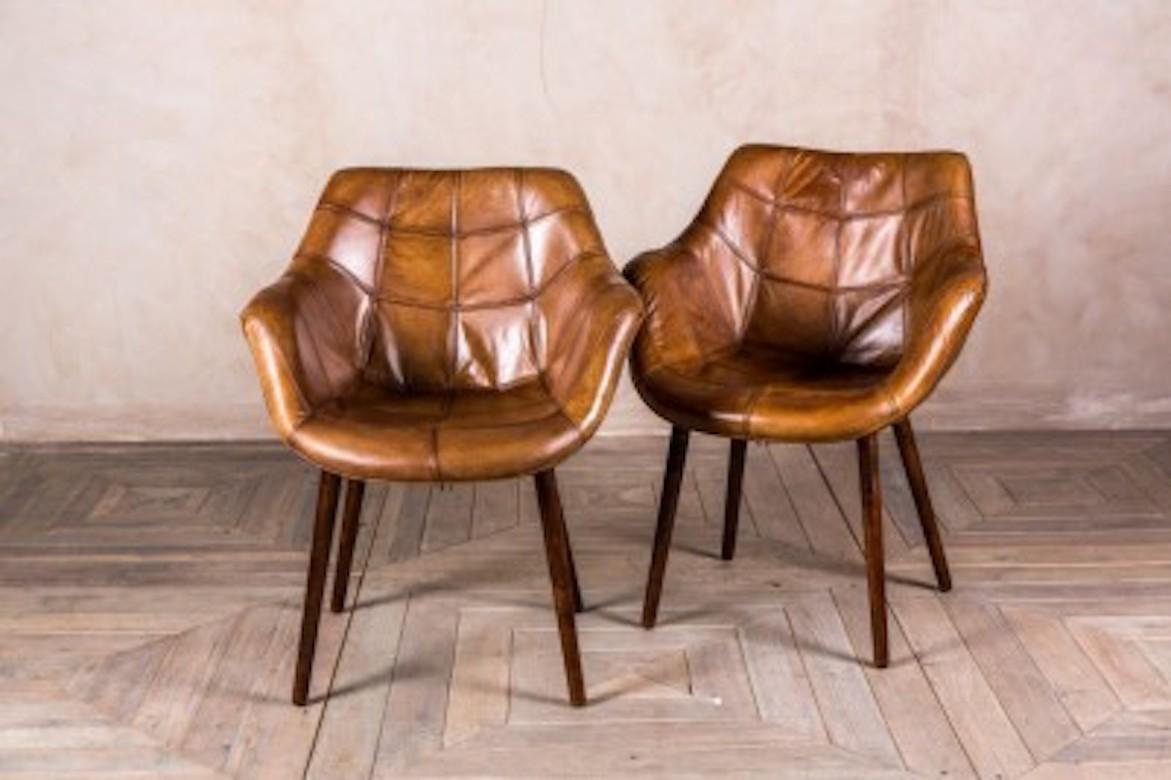 A fine Chepstow vintage style leather chair range, 20th century.

This vintage style leather chair or bucket armchair is a magnificent addition to our vast range of antique and reproduction furniture.

This superb-quality, vintage style leather