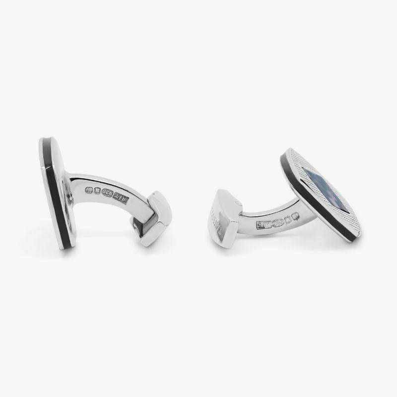 Chequer Cufflinks with Black Mother of Pearl and Onyx in Sterling Silver

Black mother of pearl and black onyx create a seamless mosaic design, centred within our signature diamond pattern case with black enamel detailing. A luxurious balance of