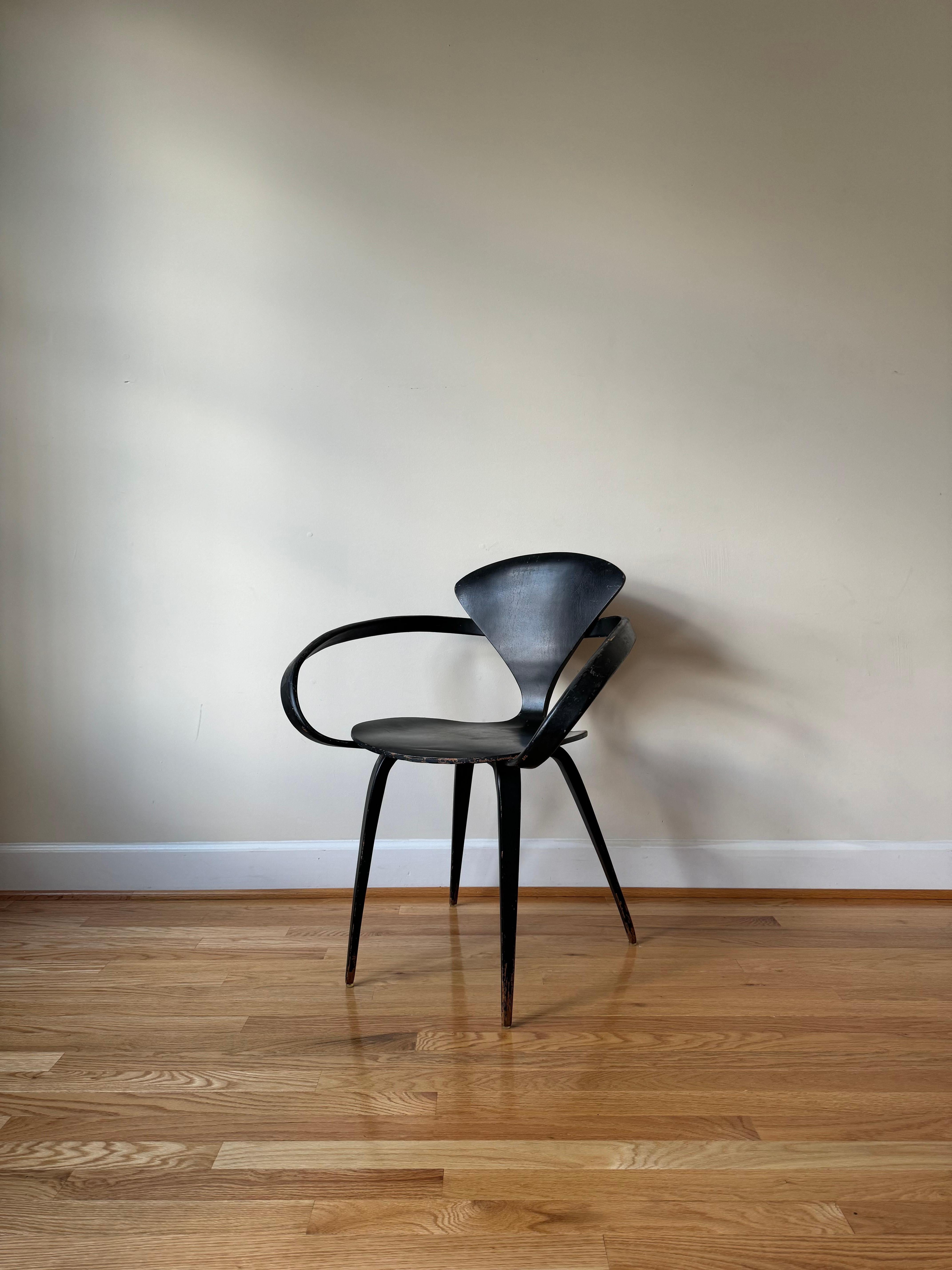 Found in design collections across the world, the Cherner chair was originally made of walnut faced moulded plywood, using similar techniques to those that Charles and Ray Eames were using for their plywood chairs (although at that time (1958) the