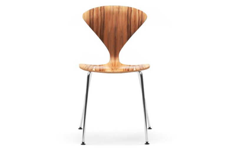 The 1958 molded plywood stacking chairs by Norman Cherner are perfect for home, office or cafe. The seat is made of laminated plywood of graduated thickness, from 15 plys to 5 plys at the perimeter of the shell. Reissued in exacting detail from the