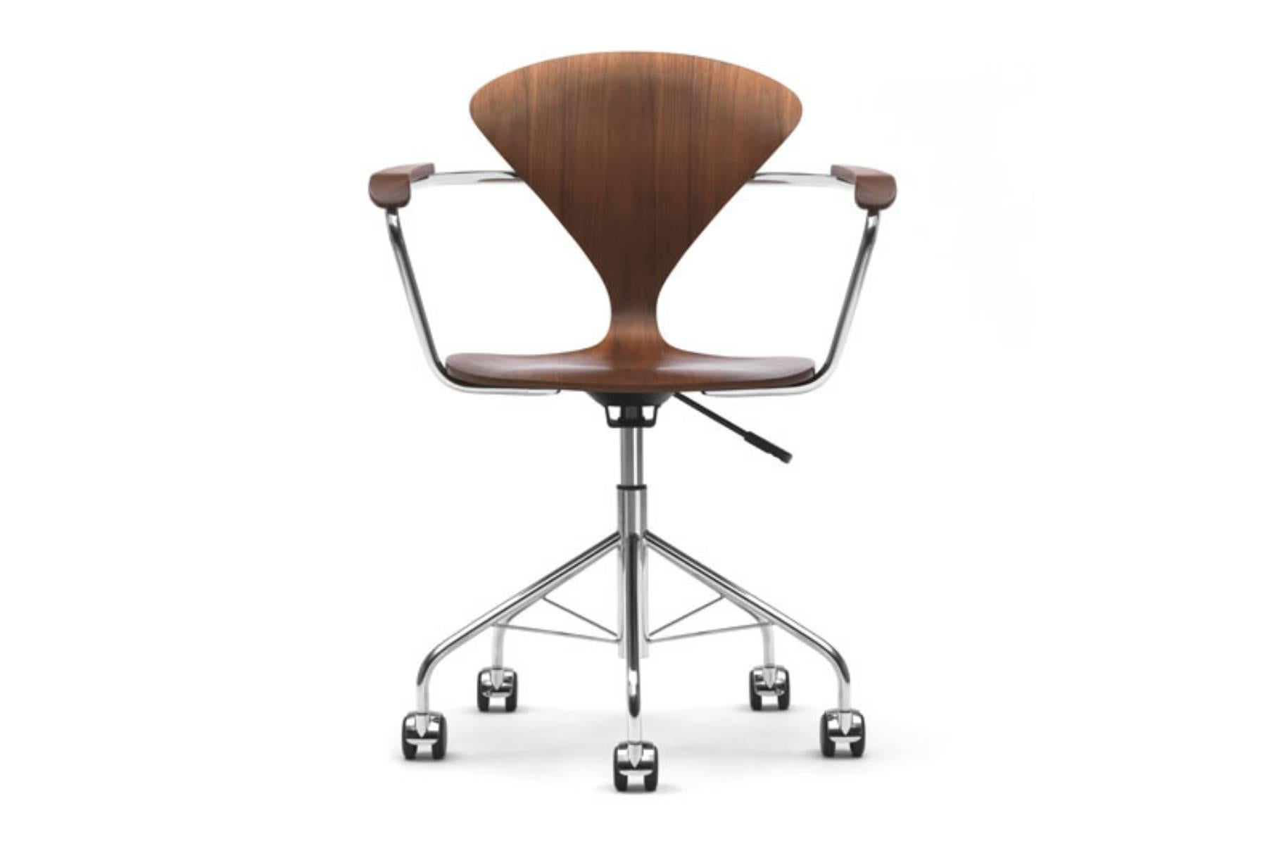 The 1958 molded plywood task chair by Norman Cherner is now available to a new generation of furniture collectors. A strong, lightweight and graceful addition to the home or office. The task chair is available with or without arms in all Cherner