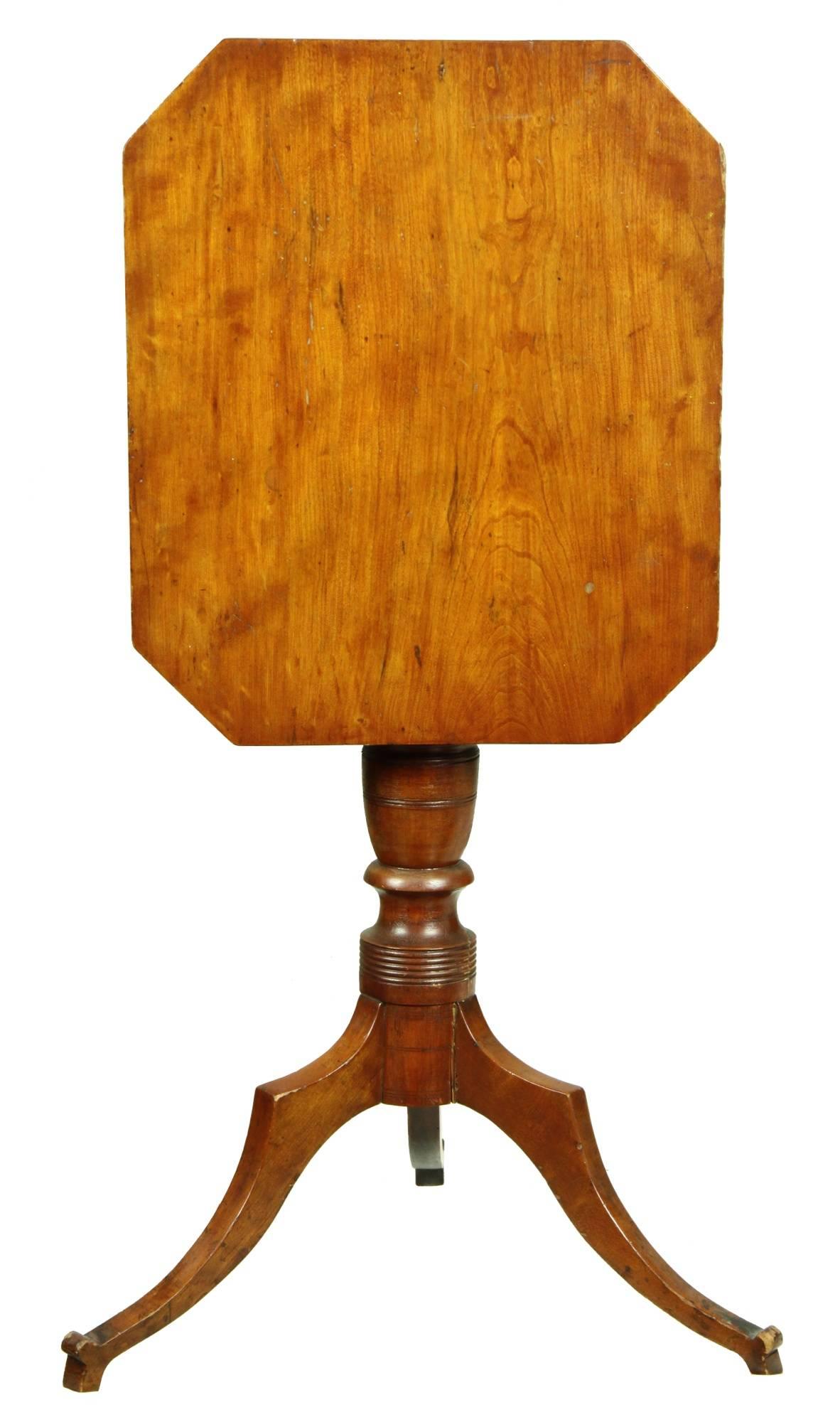 This table retains its original surface and descended in the Chute family of Winchester, MA. The legs have a form characteristic of Connecticut furniture as does the large turned urn. The top is chamfered underneath at the edge, a refined technique