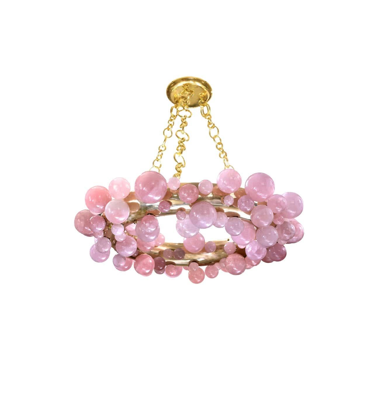 Pink bubble ring rock crystal chandelier by Phoenix with polish brass frame. 
Created by Phoenix Gallery, NYC.
Each chandelier install 10 sockets. Use 60w LED warm light bulbs. Total of 600w. 
Custom size and metal finish upon request.
     
