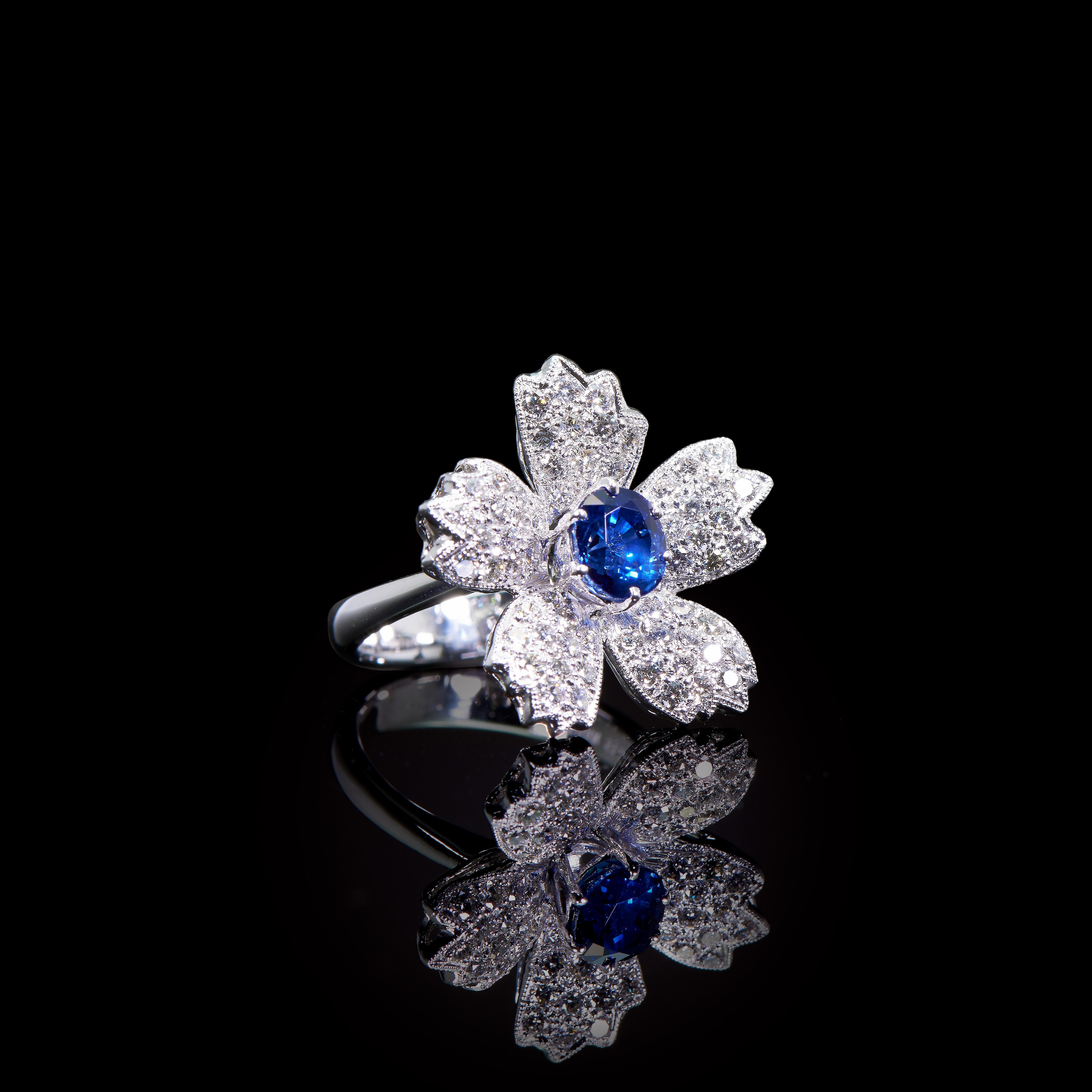 Cherry blossoms Ring (Sapphire)

1 Sapphire (1.44cts), 63 Diamonds (1.04cts), 18K White Gold.
Ring Size US 6.25

*see our other listing for the matching earrings.