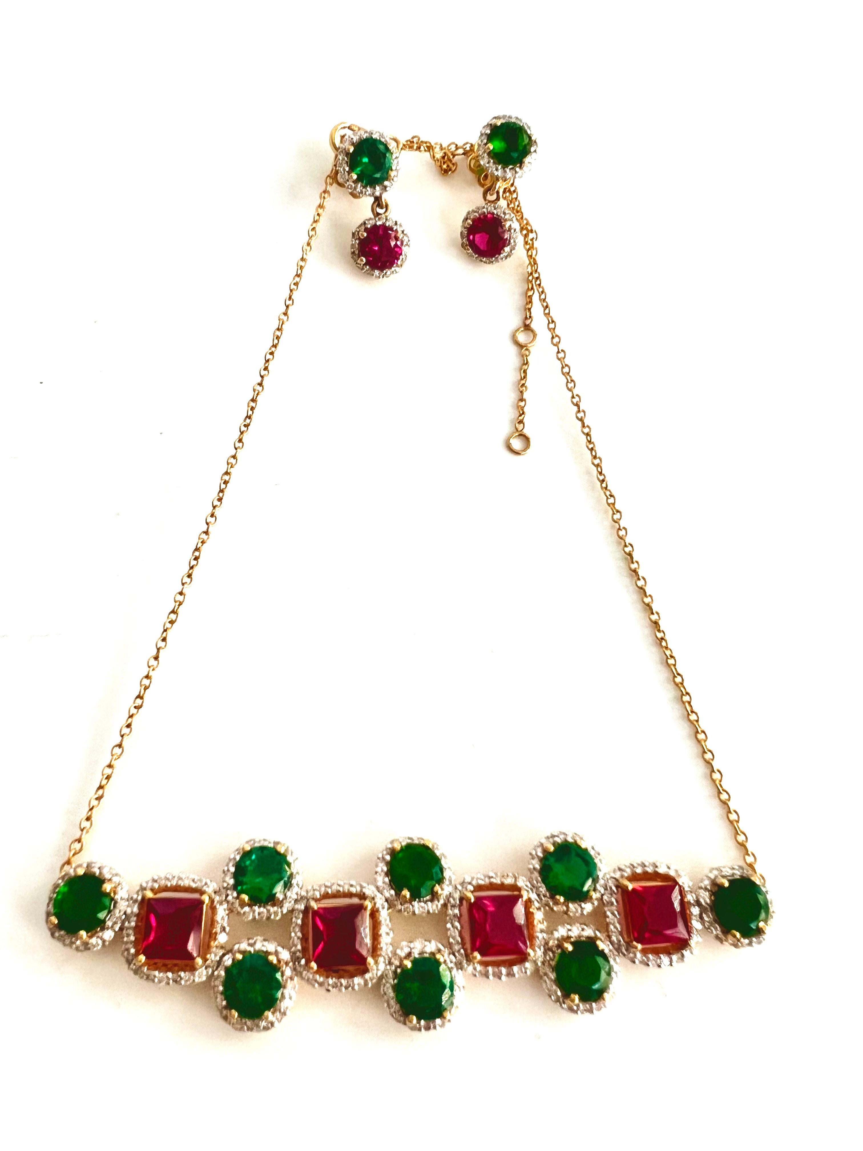 This gorgeous and chic cherry diamond choker necklace showcases sparkling diamonds and with synthetic rubies and emeralds set in 18k yellow gold.
Earrings shown here are not included and are sold separately.
choker part = 3