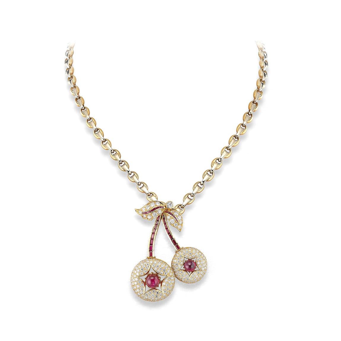 Cherry pendant in 18kt yellow gold set with diamonds 6.07 cts and cabochon and tapers cut rubies 8.53 cts with necklace in 18kt yellow and white gold        