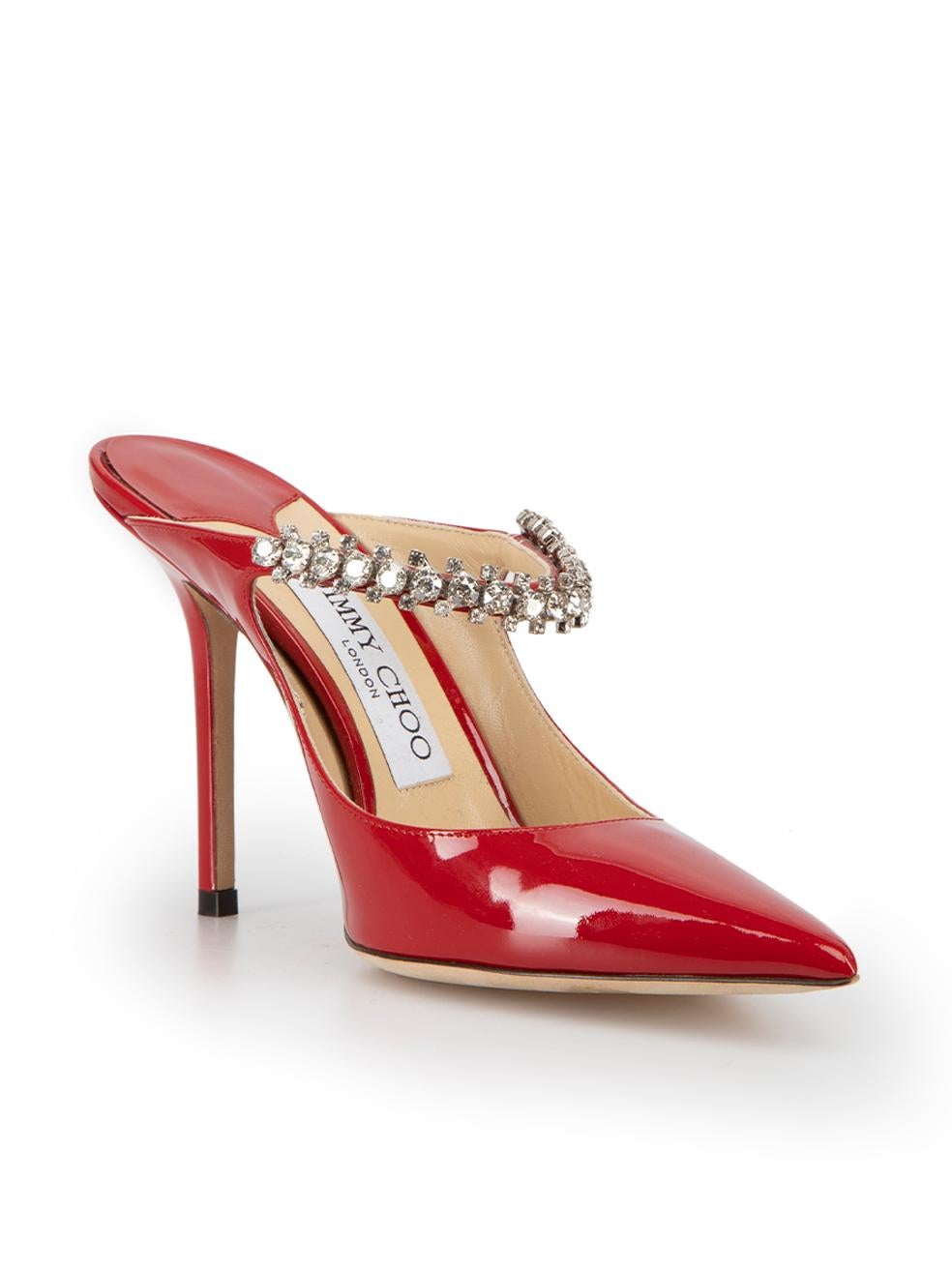 CONDITION is Very good. Hardly any visible wear to mules is evident on this used Jimmy Choo designer resale item.



Details


Red

Patent leather

Pointed toe mules

High heel

Crystal embellished strap



 

Made in
