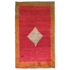 Tapis turc vintage Tulu à médaillon rouge cerise