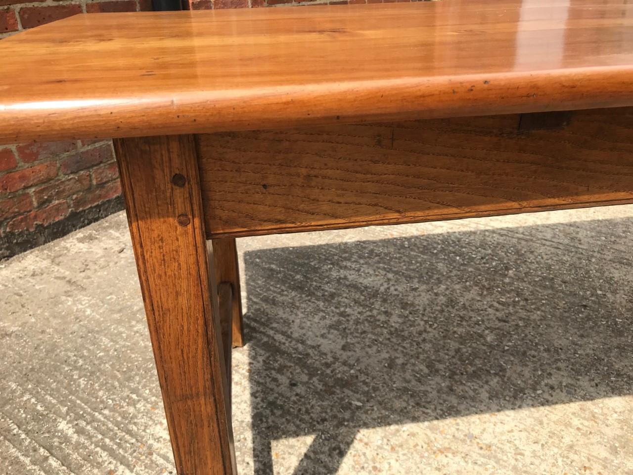 Cherry refectory dinging table with lovely three plank top. The table sits on a sturdy base supported by four square legs and H-stretcher.

  