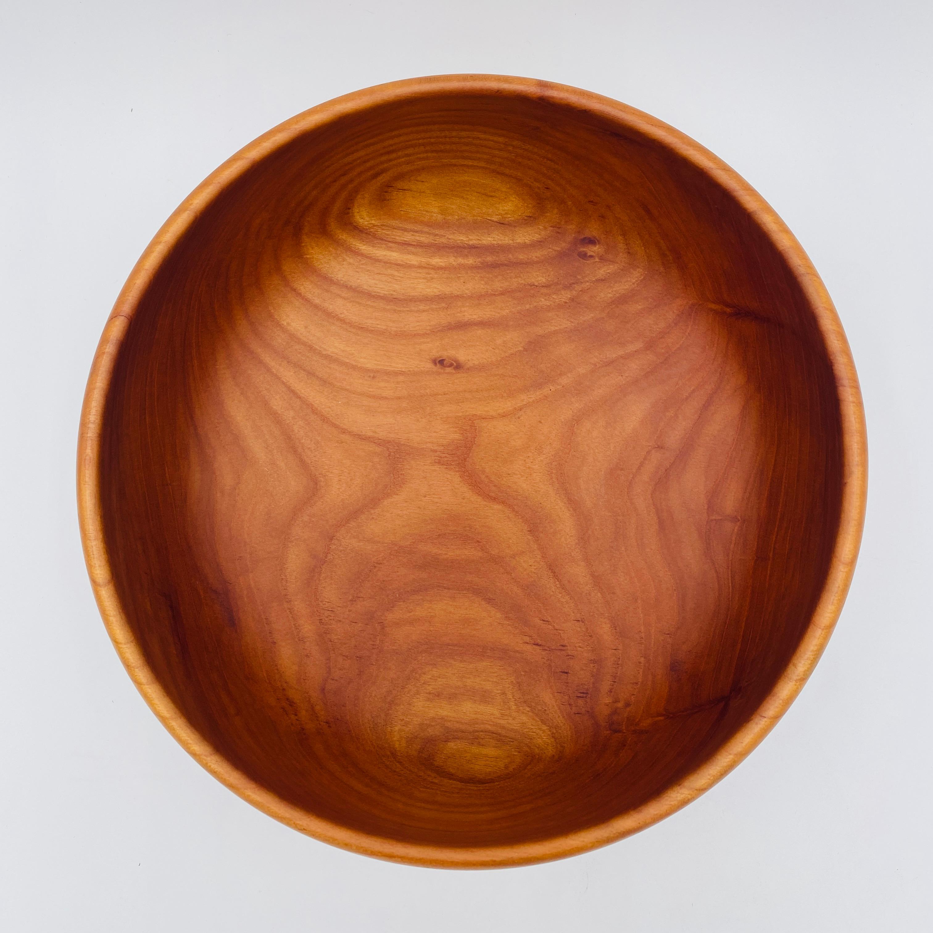 This exquisite cherry bowl was handmade in Sweden in the 1960s. The bottom of the bowl is hand-signed 