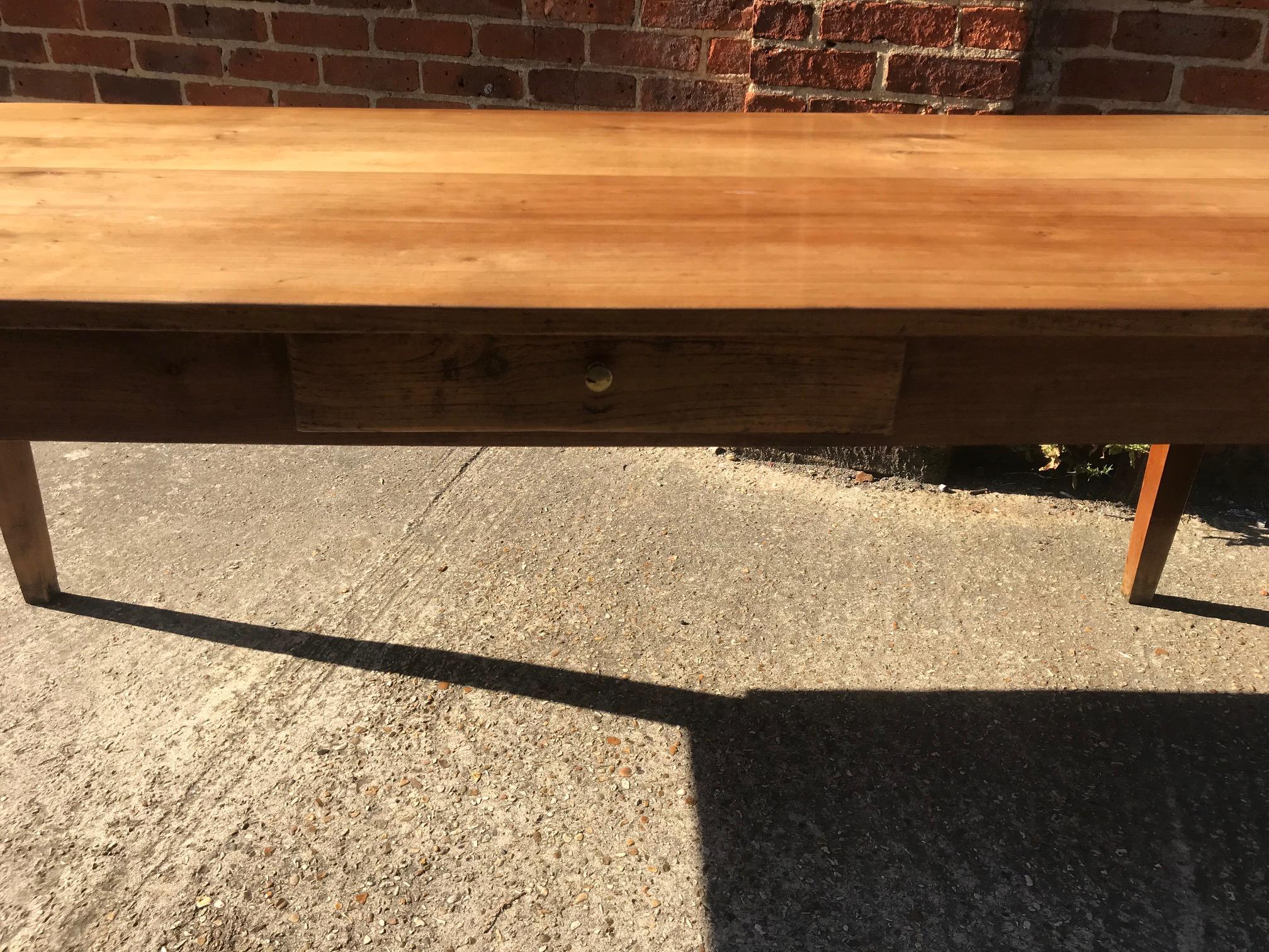 Four plank cherry tapered leg French farmhouse Table with one drawer on the side. Beautiful colour and wide planks on the top. 

Measurements:
H 29in (73.7cm)
W 33in (83.8cm)
L 79in (200.7cm).


 