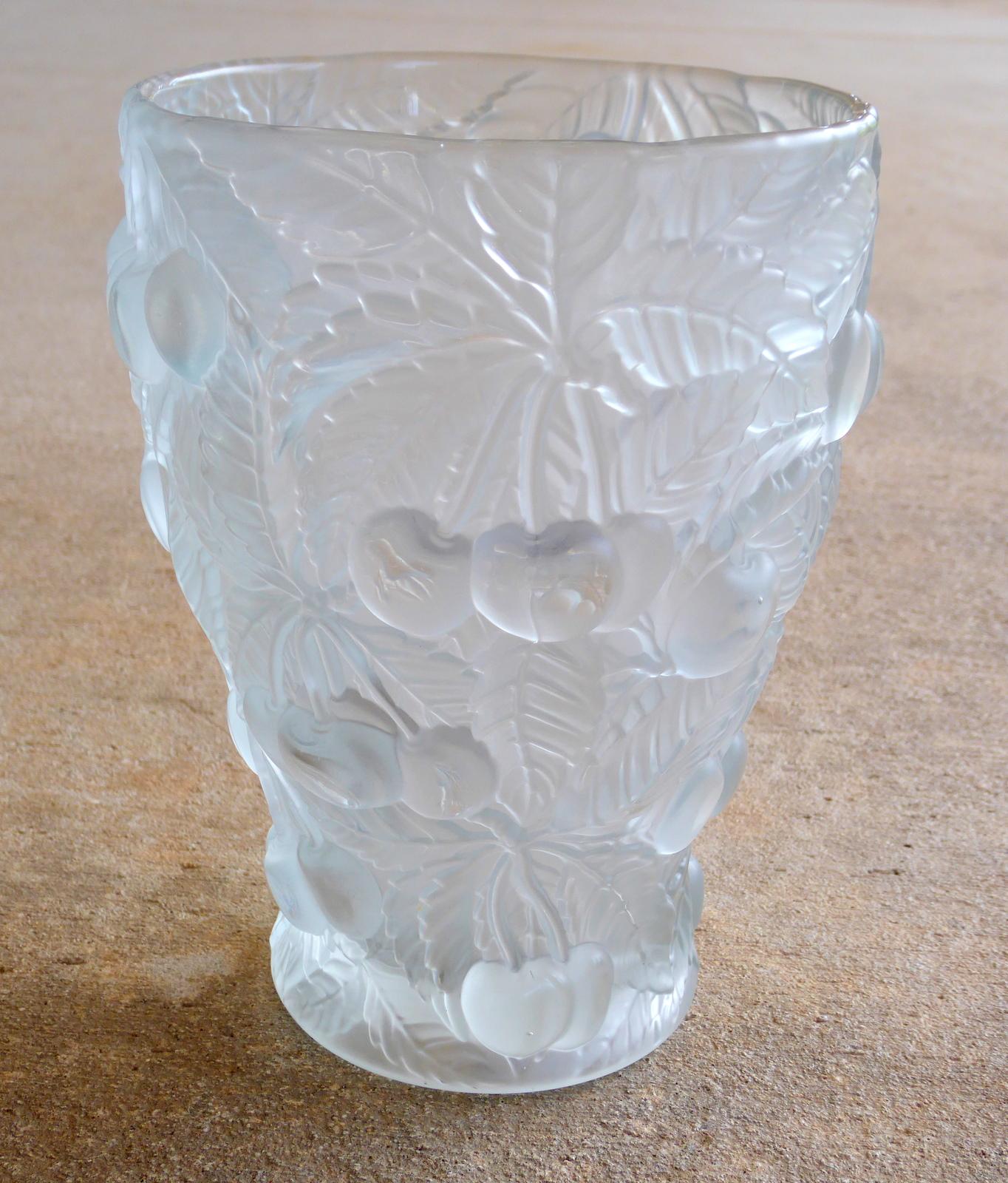 Easily mistaken for Lalique, this lovely 'Cherry' art glass vase in the Barolac line was designed circa 1935 by Czech artist Josef Inwald for John Jenkins & Son of London. It has marvelously high-relief cherry forms in etched and polished glass.

A