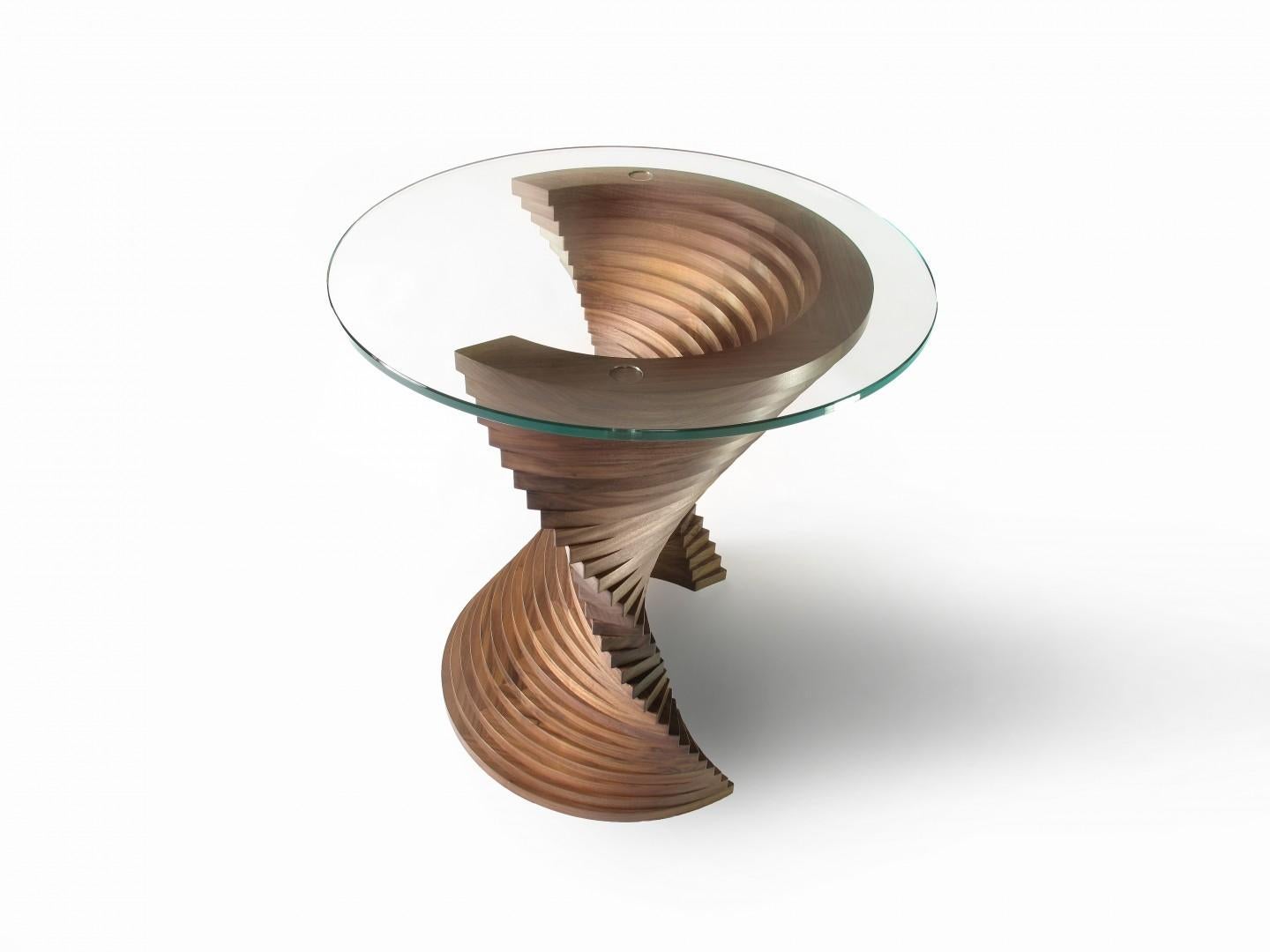 Cherry, Walnut and Glass Aguaviva Side Table by David TragenDimensions:  W 52 x D 52 x H 54 cm
Materials: Cherry, Walnut (solid), 10mm toughened glass.
Weight: 15 kg.

About: He left university with a degree in International Business in 1994, but