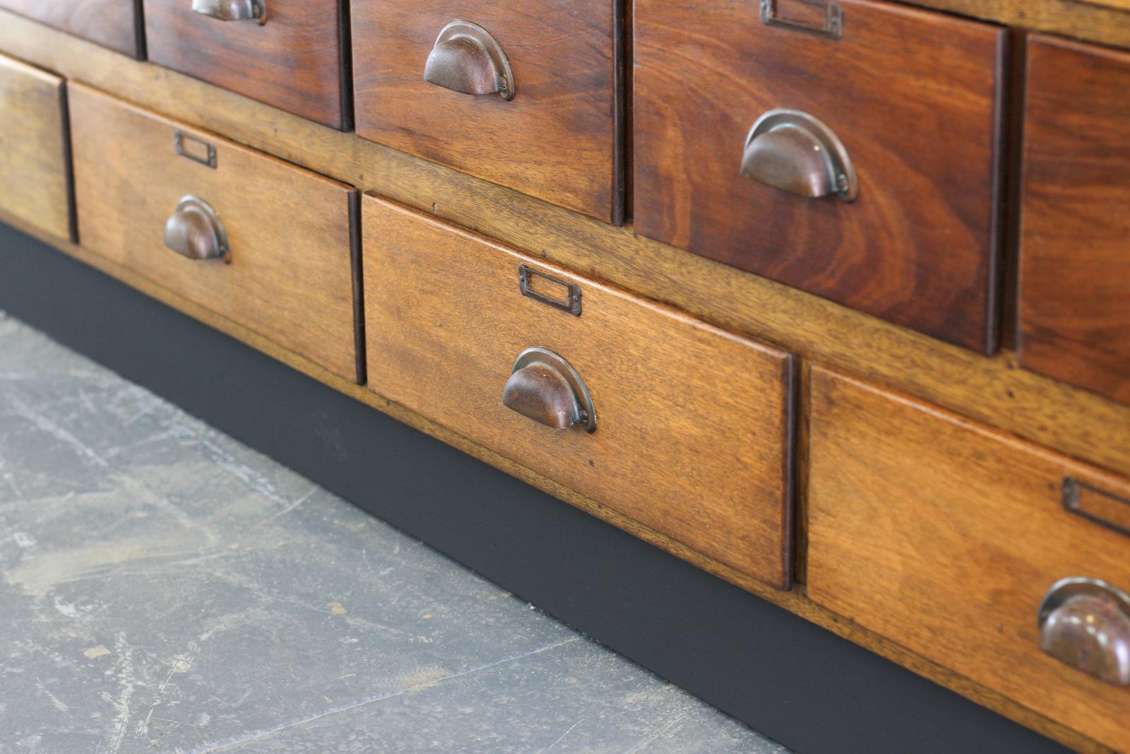 Cherry wood boots pharmacy drawers, circa 1920s.

Product code #OA556

- Worldwide shipping
- All prices includes VAT
- Solid Cherry wood sides and top
- Copper and tin handles and card holders
- Solid Cherry wood drawers with beautiful