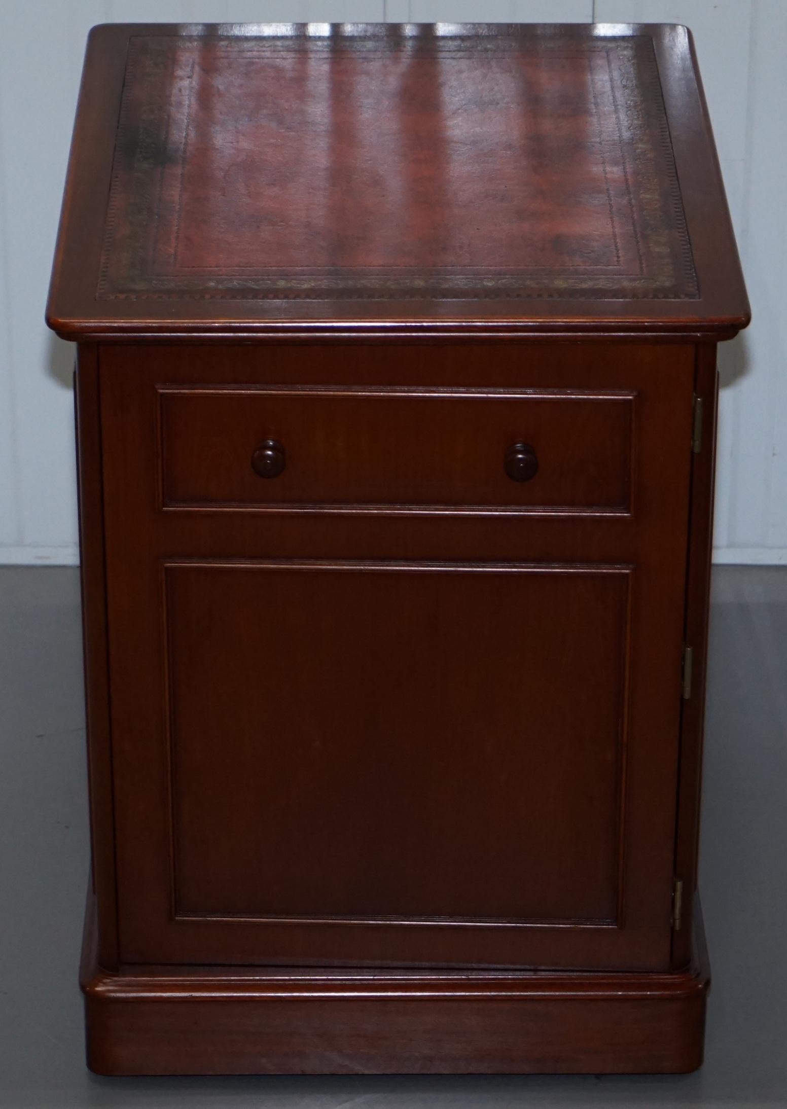 We are delighted to offer for sale this lovely solid cherrywood office cupboard with sliding printer shelf and oxblood leather top

This piece is part of a suite, the entire collection includes a twin pedestal partner desk, a pair of tall thing