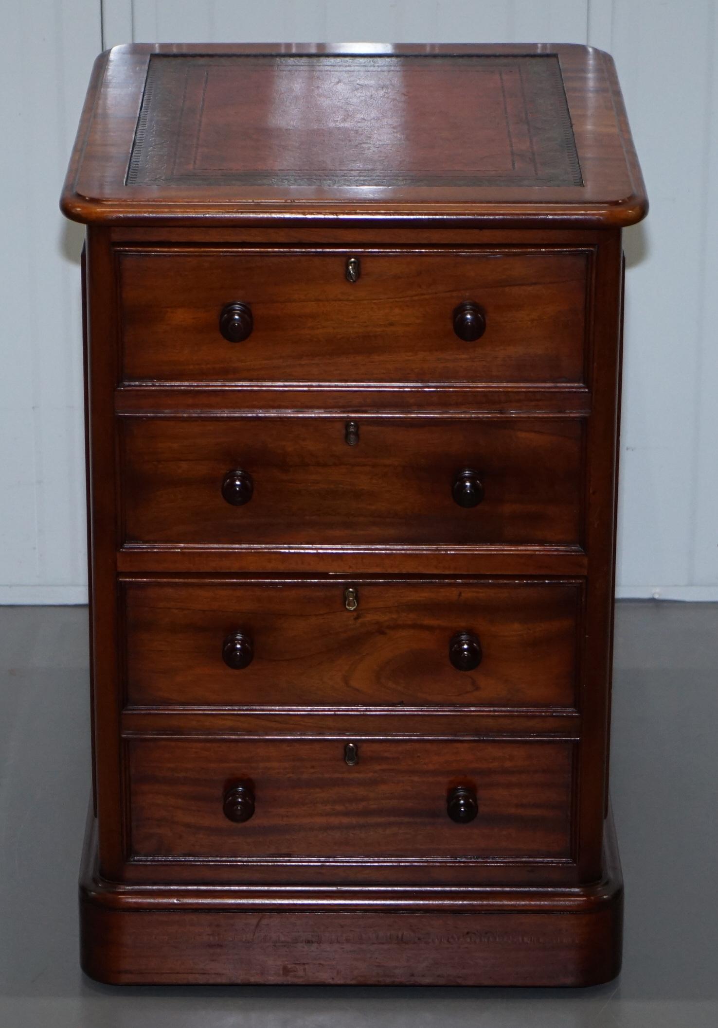 We are delighted to offer for save this lovely solid cherrywood office filing cabinet with oxblood leather top

This piece is part of a suite, the entire collection includes a twin pedestal partner desk, a pair of tall thin bookcases, a side
