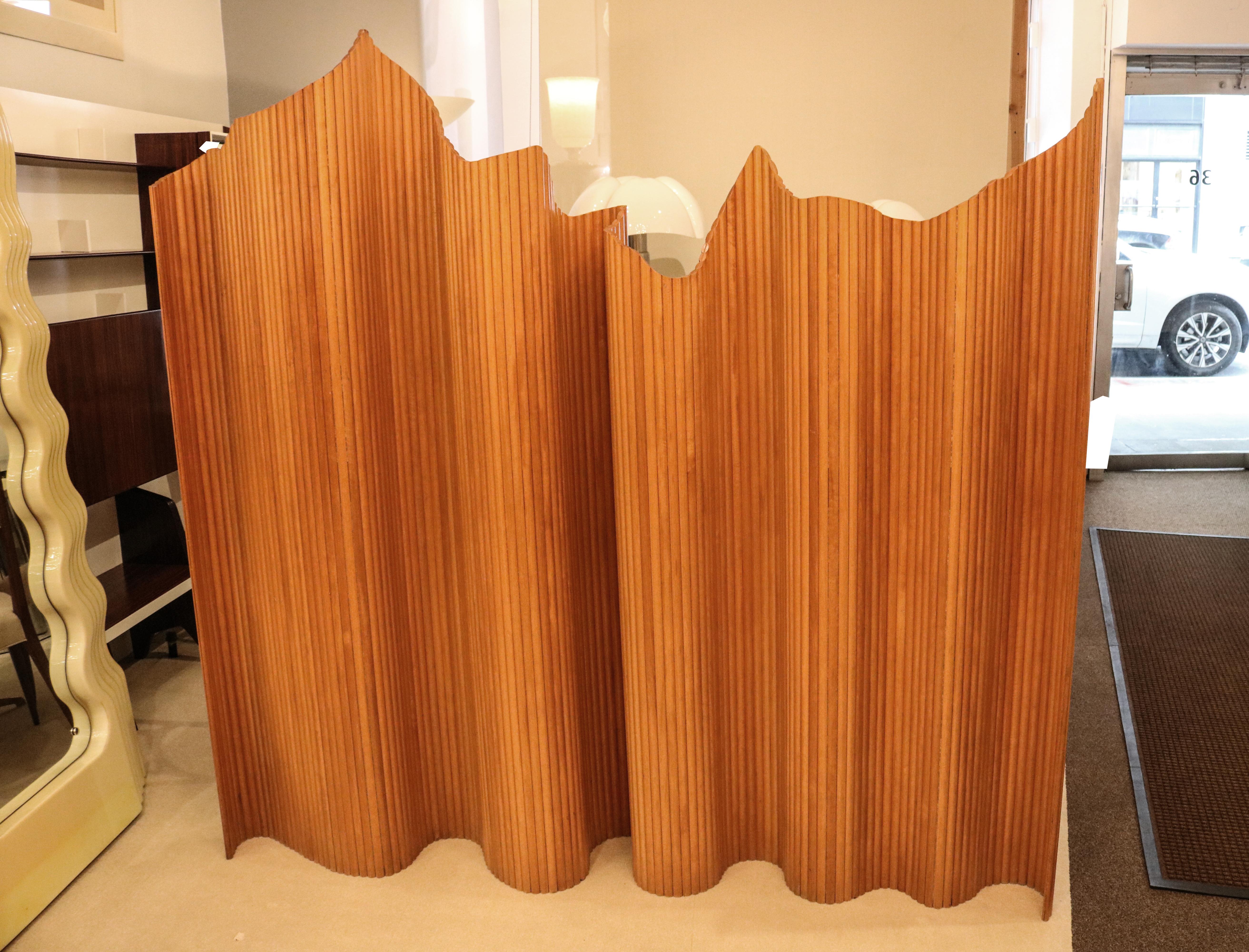 Cherrywood Italian Modernist tambour screen / room divider. Beautiful interior design element crafted from vertical cherrywood slats and can be rolled up and opened in numerous dynamic curved positions.

Max H: 70¼    Min H: 55  Fully Extended W: