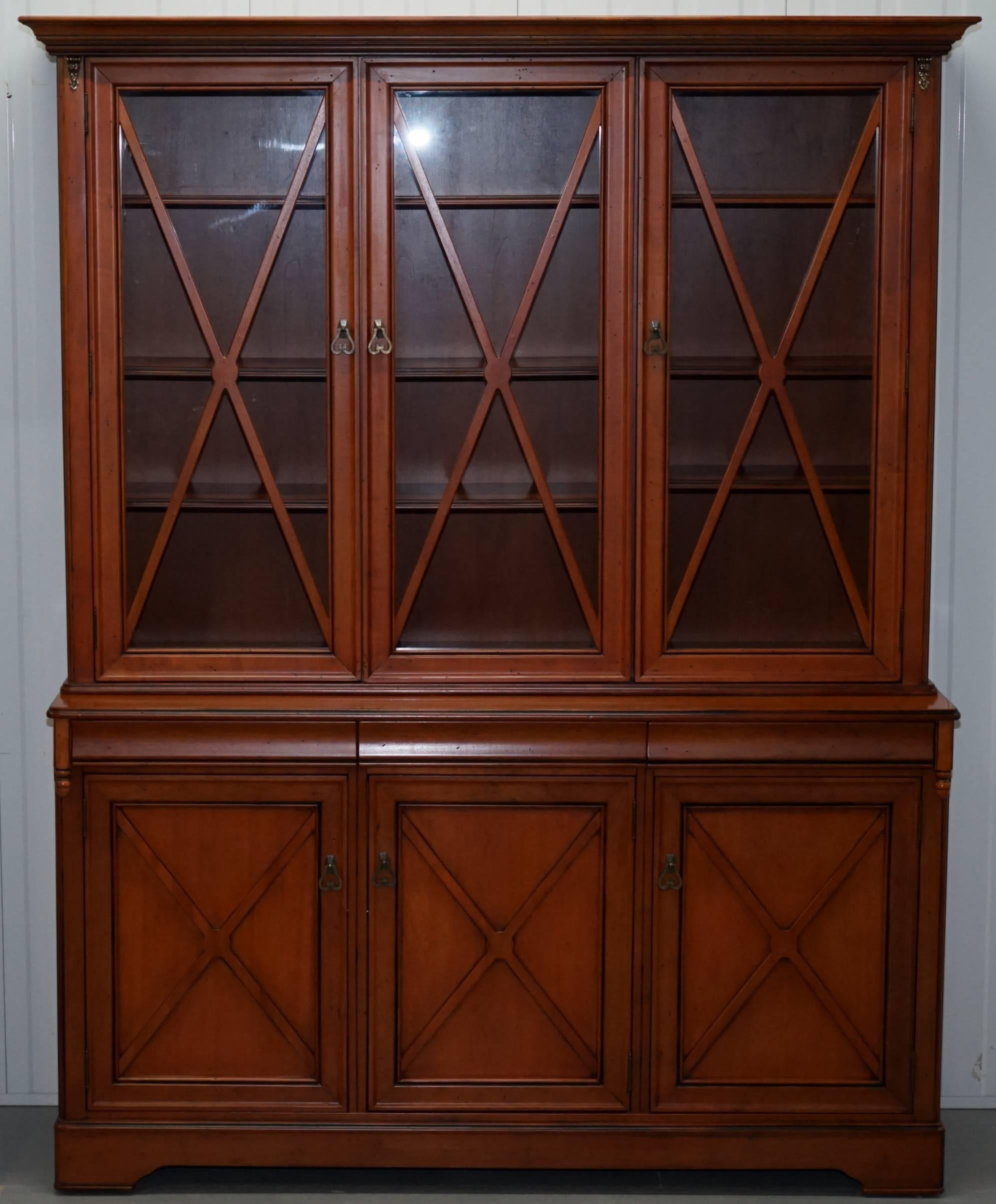 We are delighted to offer for sale this very nice cherry and hardwood welsh dresser display cabinet

A good looking well made and decorative piece with Omalu mounted detailing. We have cleaned waxed and polished it, there is the odd little mark