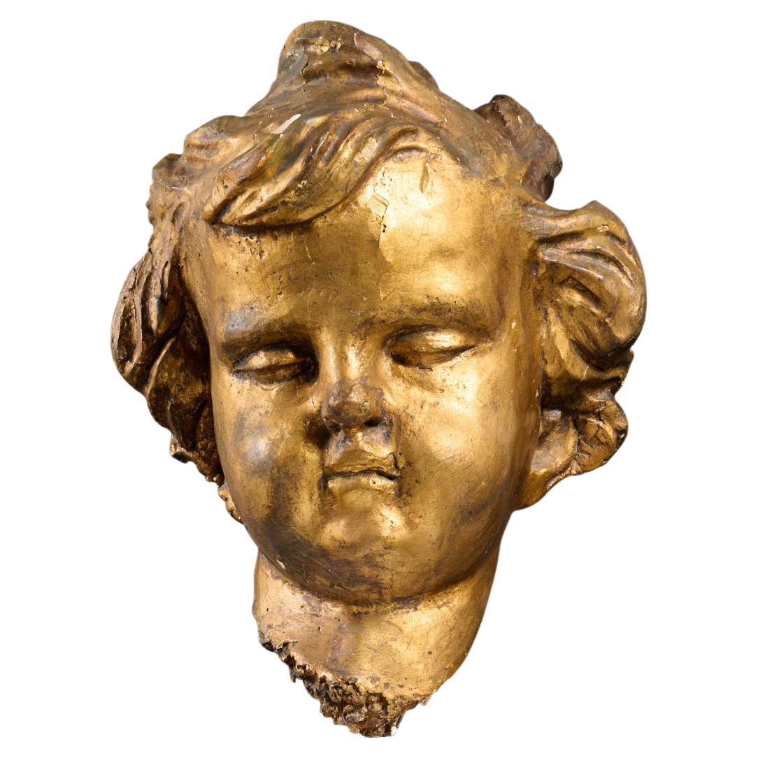 Cherub Head Fragment With Gold Leaf on Newer Lucite Base For Sale