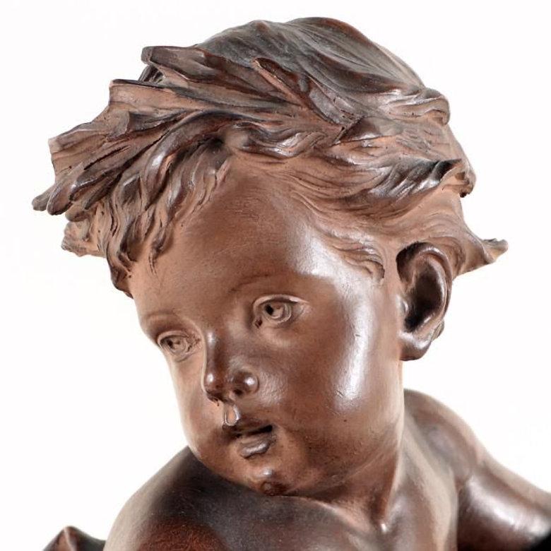 Cherub with water jug Terracotta sculpture on Verdigris marble base after a model by Albert-Ernest Carrier-Belleuse. Apparently unsigned.