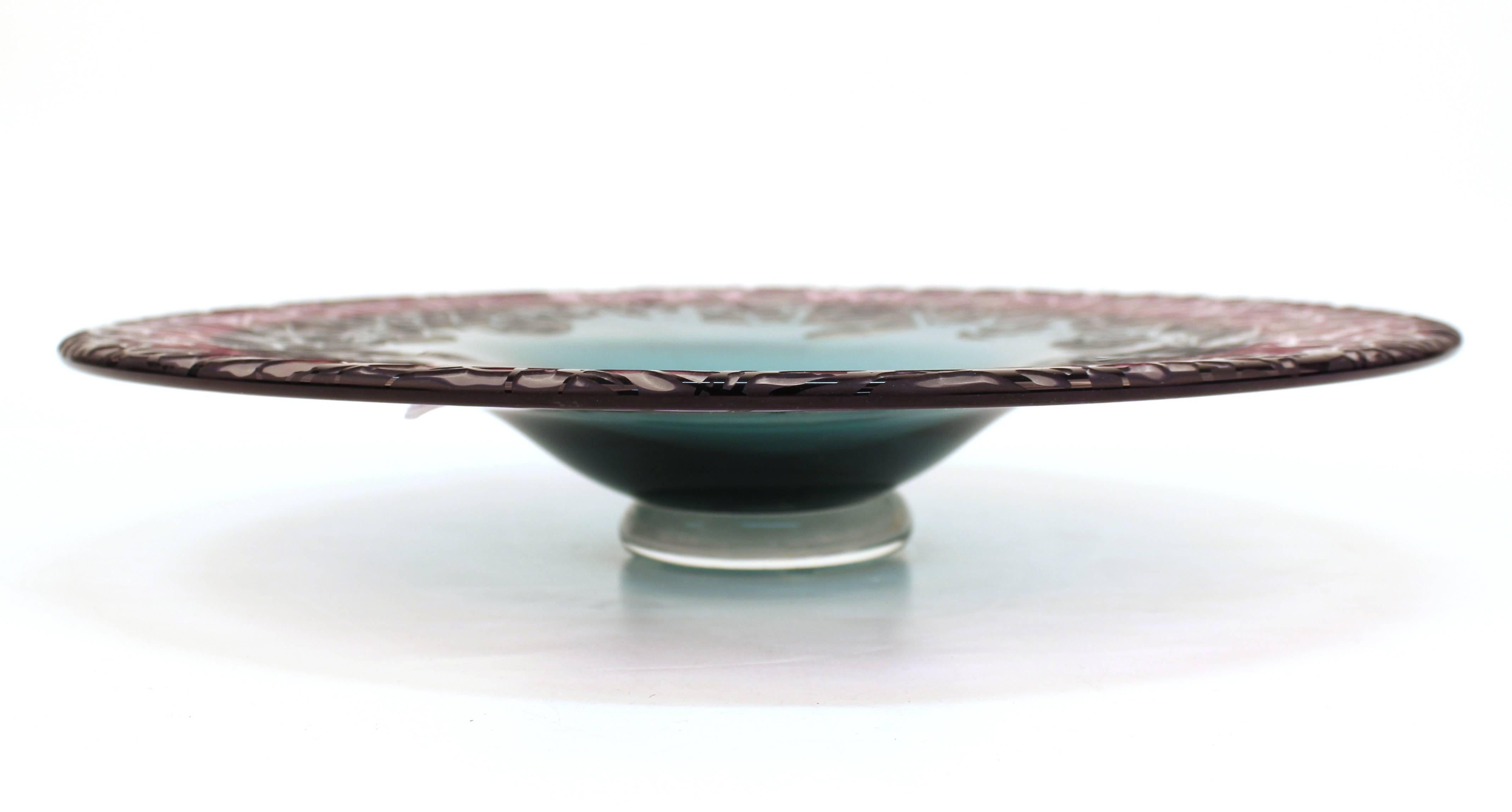 Canadian studio art glass compote dish made by Cheryl Takacs. The piece is layered in multiple shades and has a wide decorative border.