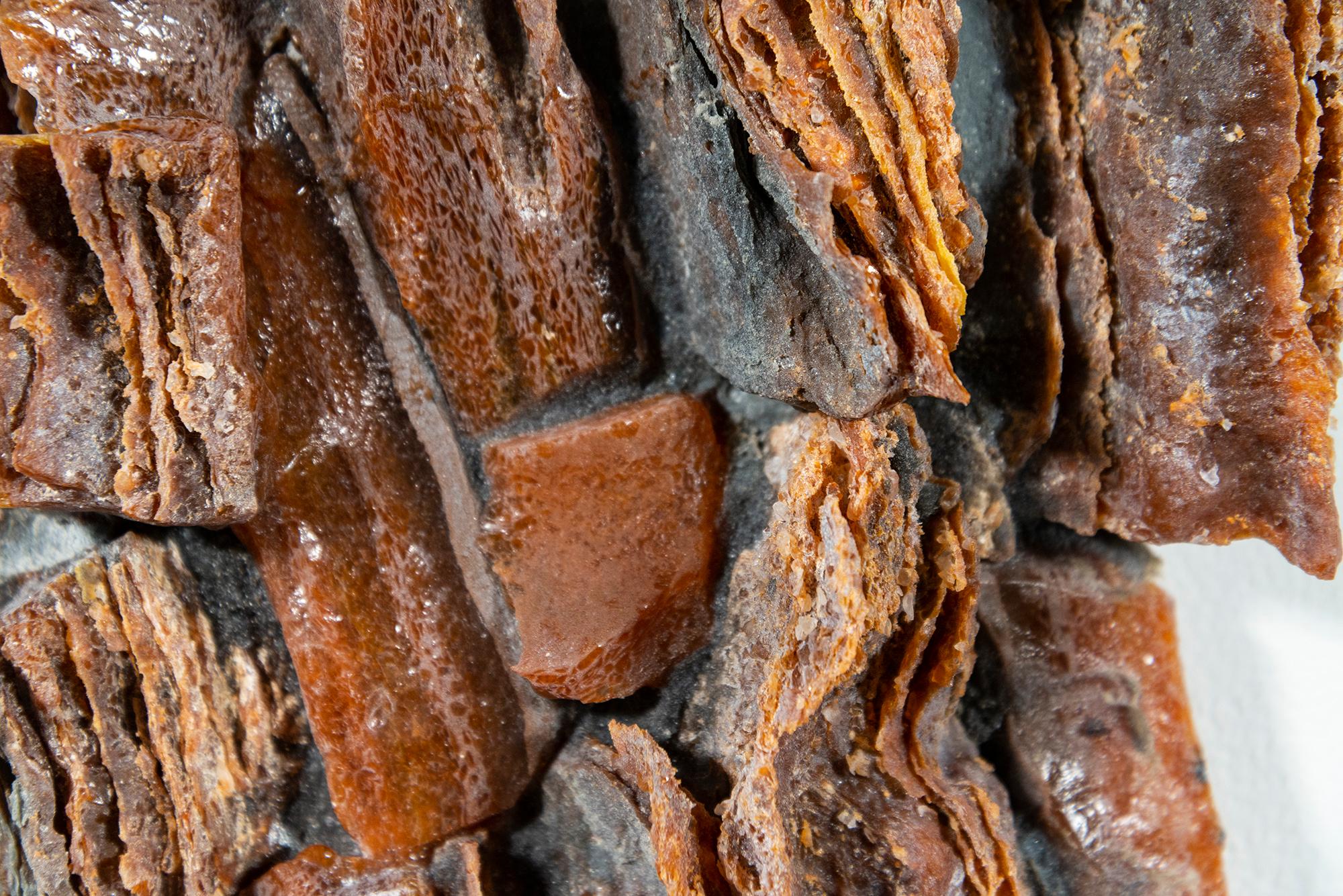This contemporary wall sculpture is made of fired glass; its design is inspired by nature and rock formations.

Cheryl Wilson Smith’s uniquely striking wall sculptures are inspired by nature—the rugged, wild beauty of the Canadian Shield that