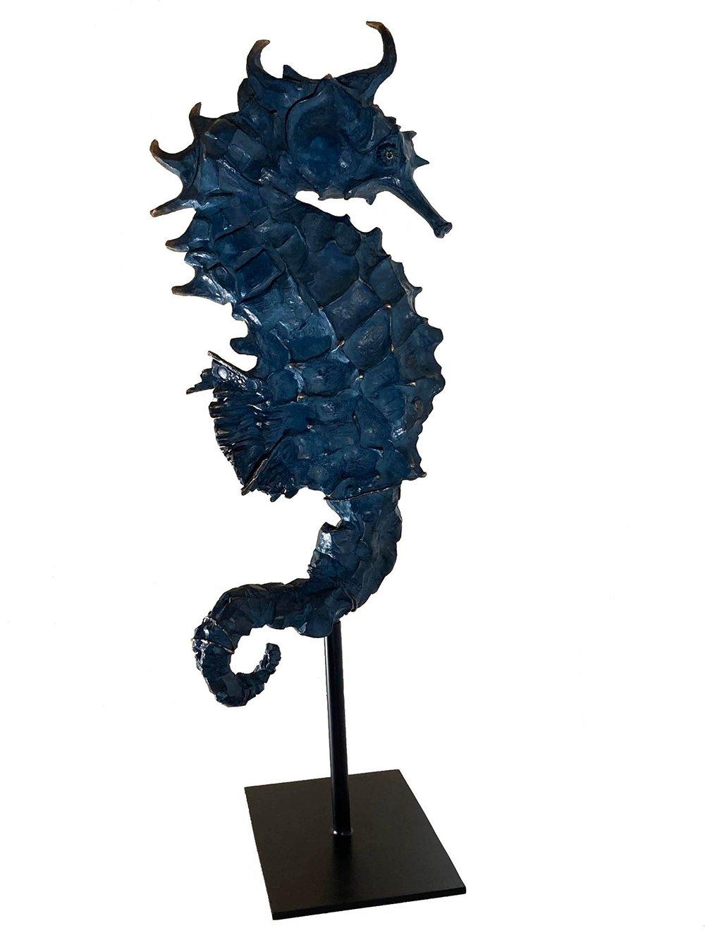 Ultramarine Rex Seahorse is a unique bronze sculpture by contemporary artist Chésade, dimensions are 114 × 40 × 17 cm (44.9 × 15.7 × 6.7 in). 
The sculpture is signed and comes with a metal stand and a certificate of authenticity.

The sculptures by