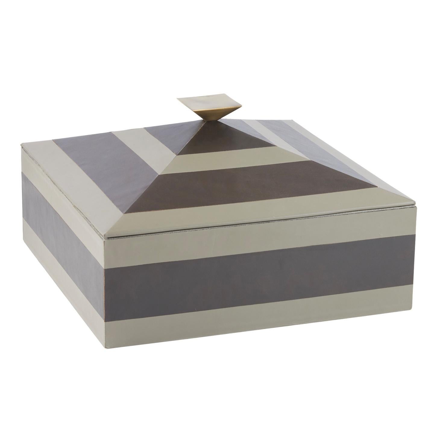 A refined blend of texture, geometry, and craftsmanship, this striking pyramid-inspired leather box brings a sophisticated touch to any tabletop, console, or shelving display. Tonal stripes add a tailored, structured finish to the design, combining