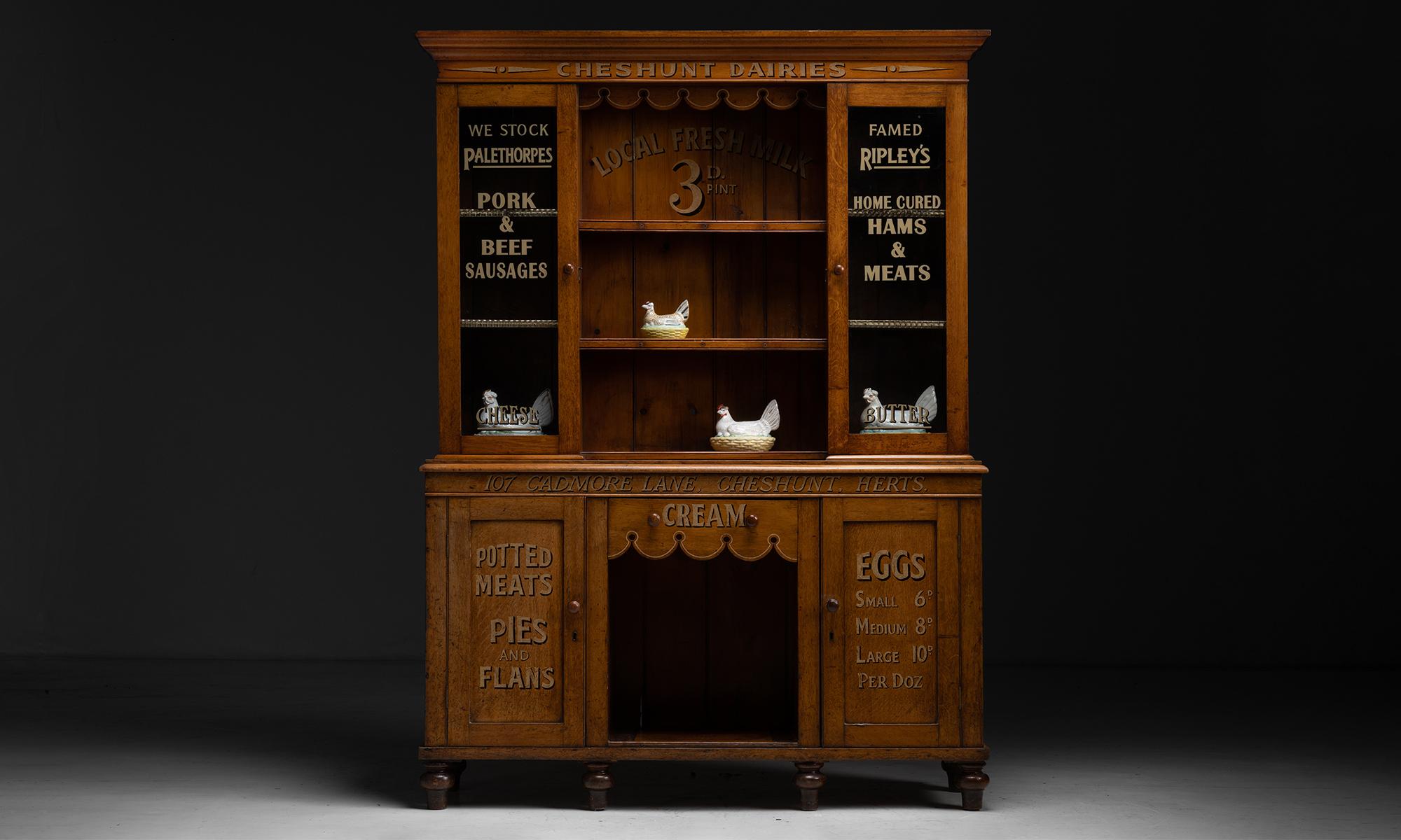 “Cheshunt Dairies” Display Cabinet, England, circa 1910

Victorian display cabinet. Hand painted, constructed in pine.

Measures 59”w x 17”d x 81.5”h.