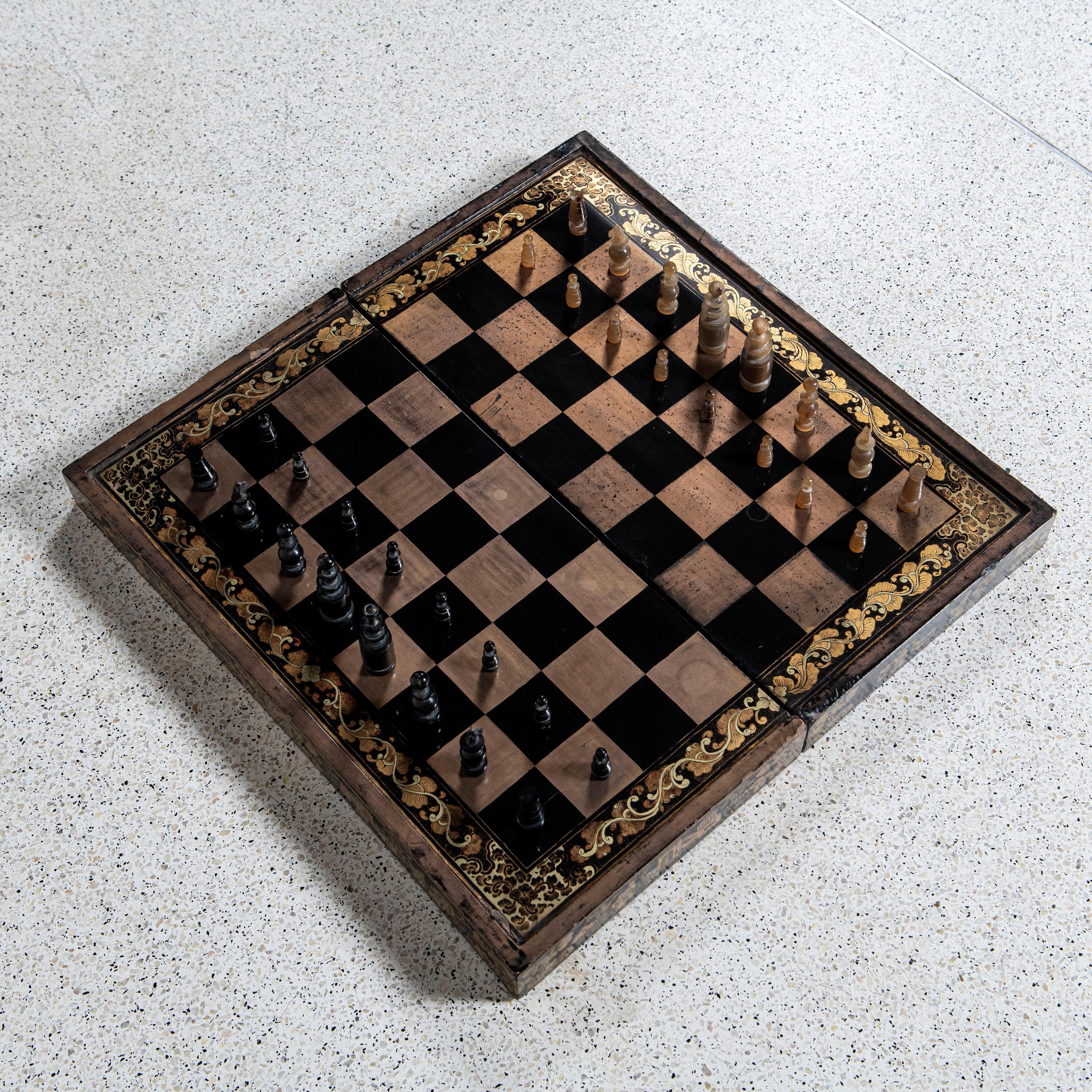Chess and backgammon lacquered wood board. China, late 19th century.