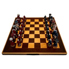 Scacchiera con pezzi di scacchi in ceramica realizzati a mano