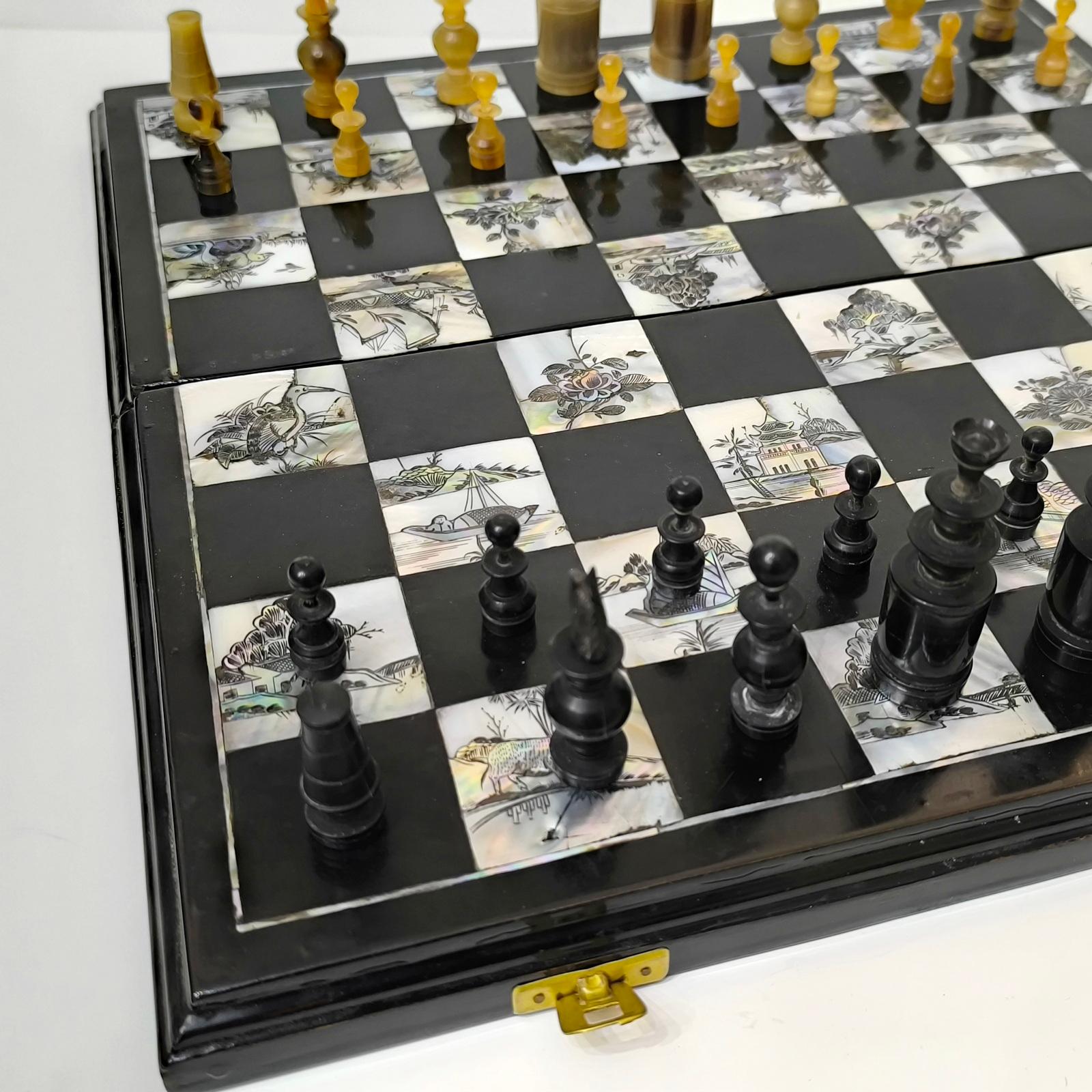 Early 20th Century Chess Game Set with Handmade Mother-of-Pearl Inlaid Chessboard Black Lacquered For Sale